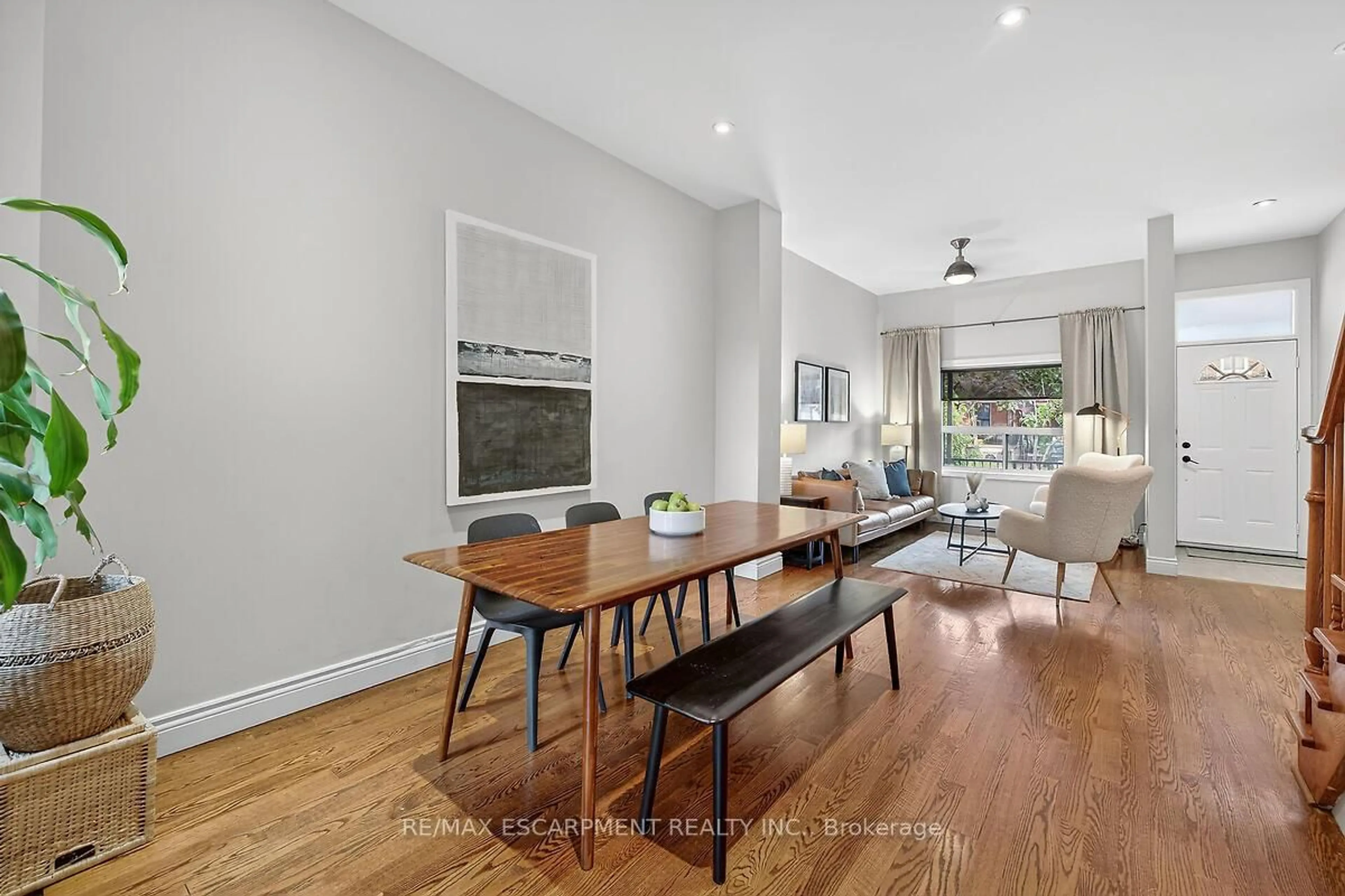 Dining room, wood/laminate floor for 690 Dufferin St, Toronto Ontario M6K 2B5