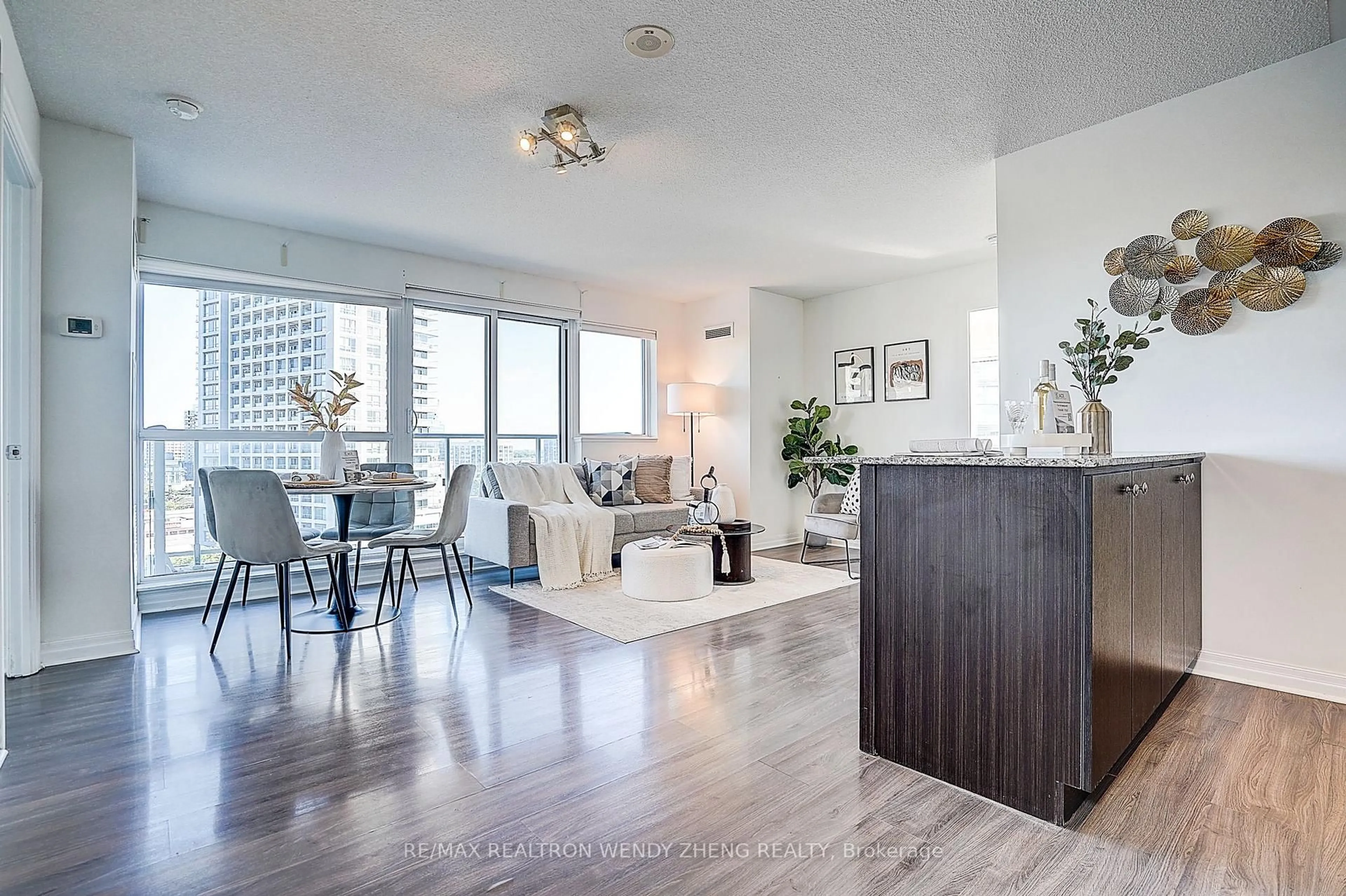 Living room with furniture, wood/laminate floor for 2015 Sheppard Ave #810, Toronto Ontario M2J 1W6