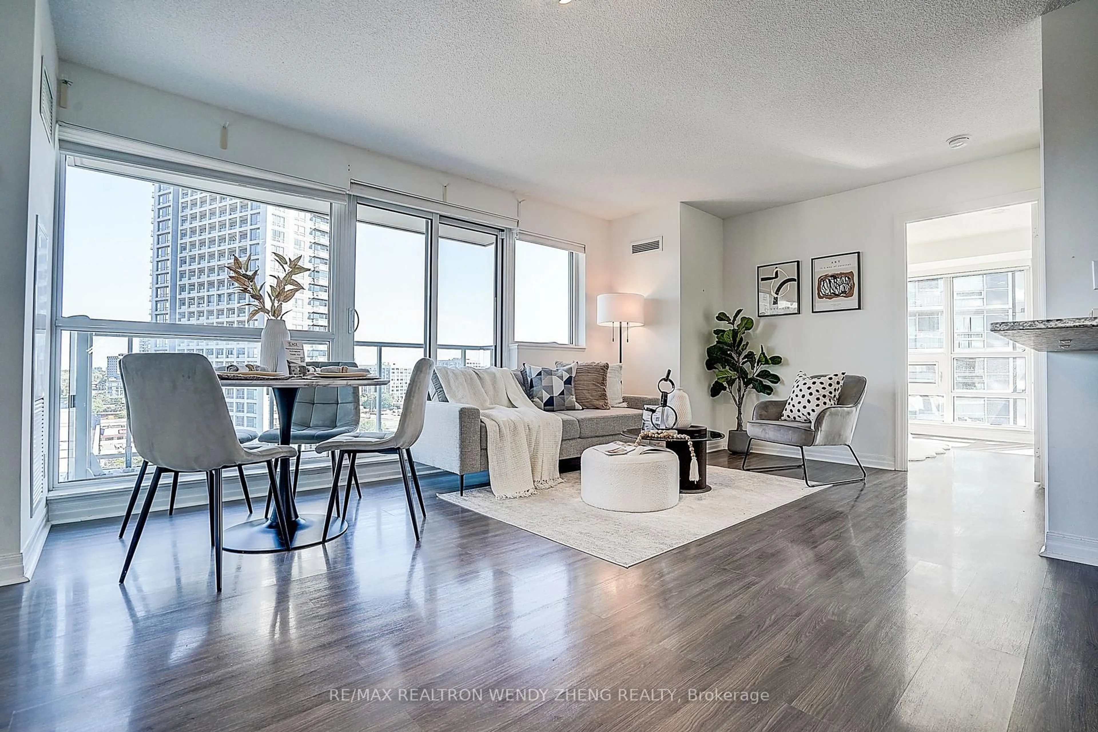 Living room with furniture, wood/laminate floor for 2015 Sheppard Ave #810, Toronto Ontario M2J 1W6