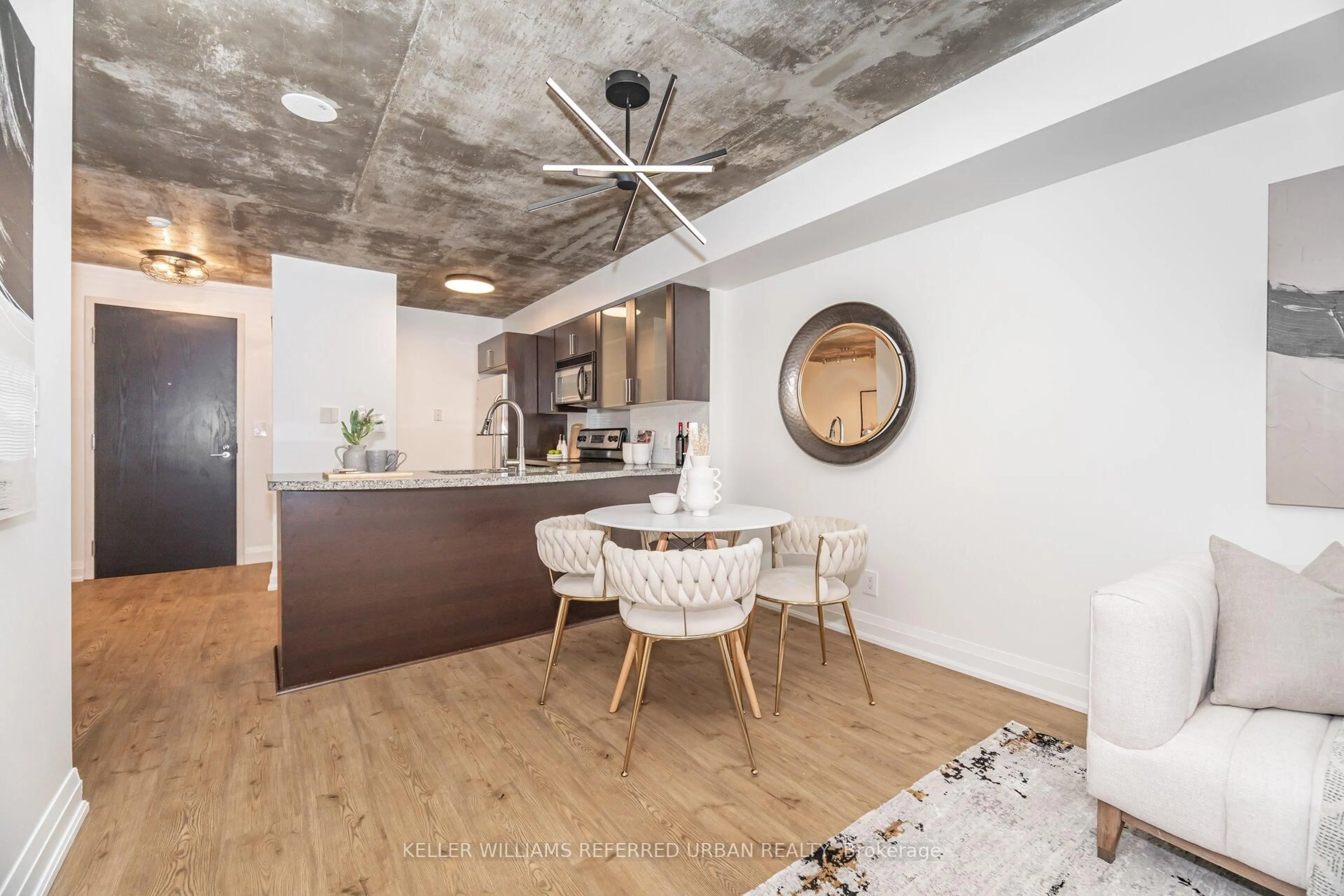 Open concept kitchen, cement floor for 1005 King St #414, Toronto Ontario M6K 3M8