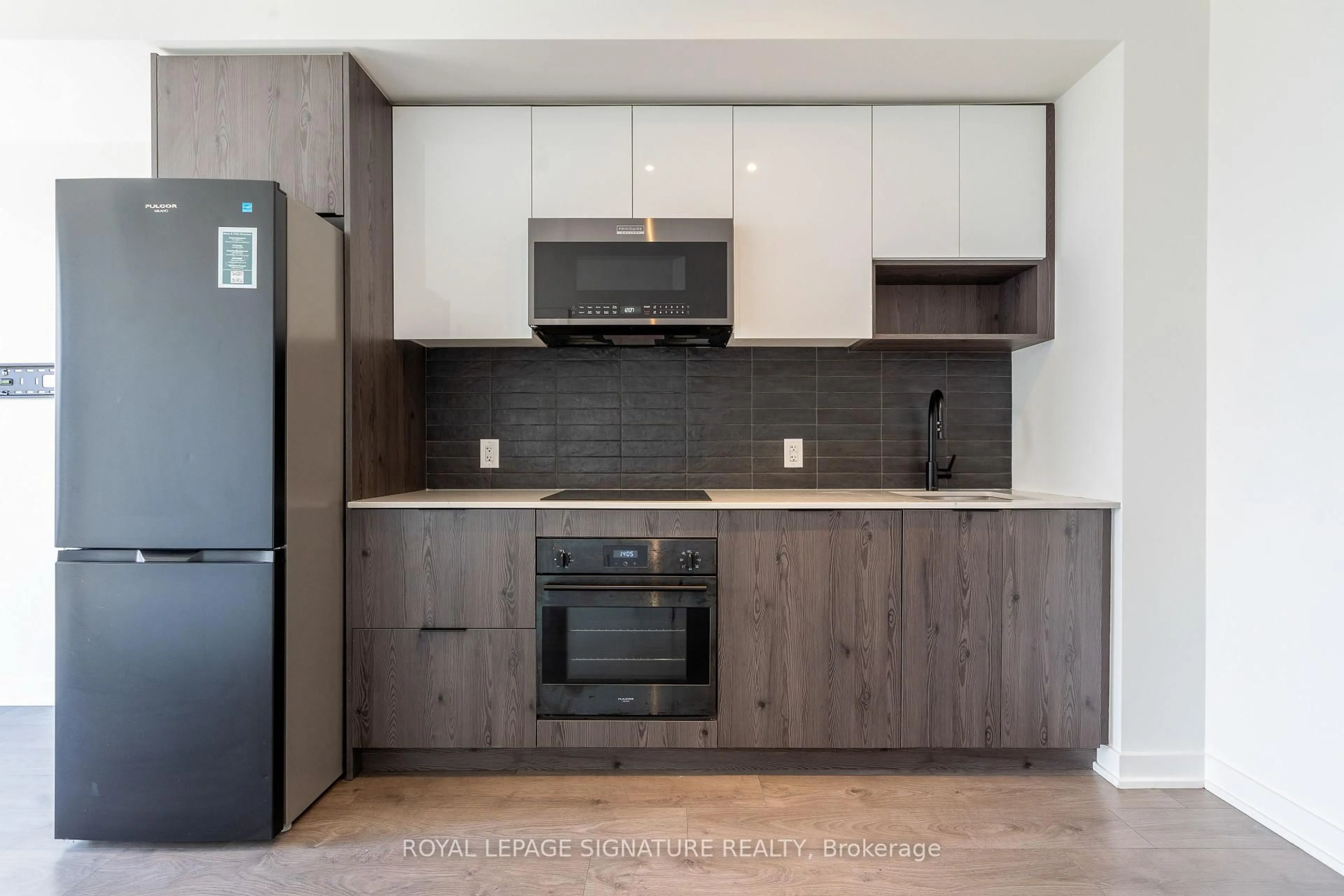 Standard kitchen, wood/laminate floor for 5 Defries St #1804, Toronto Ontario M5A 0W7