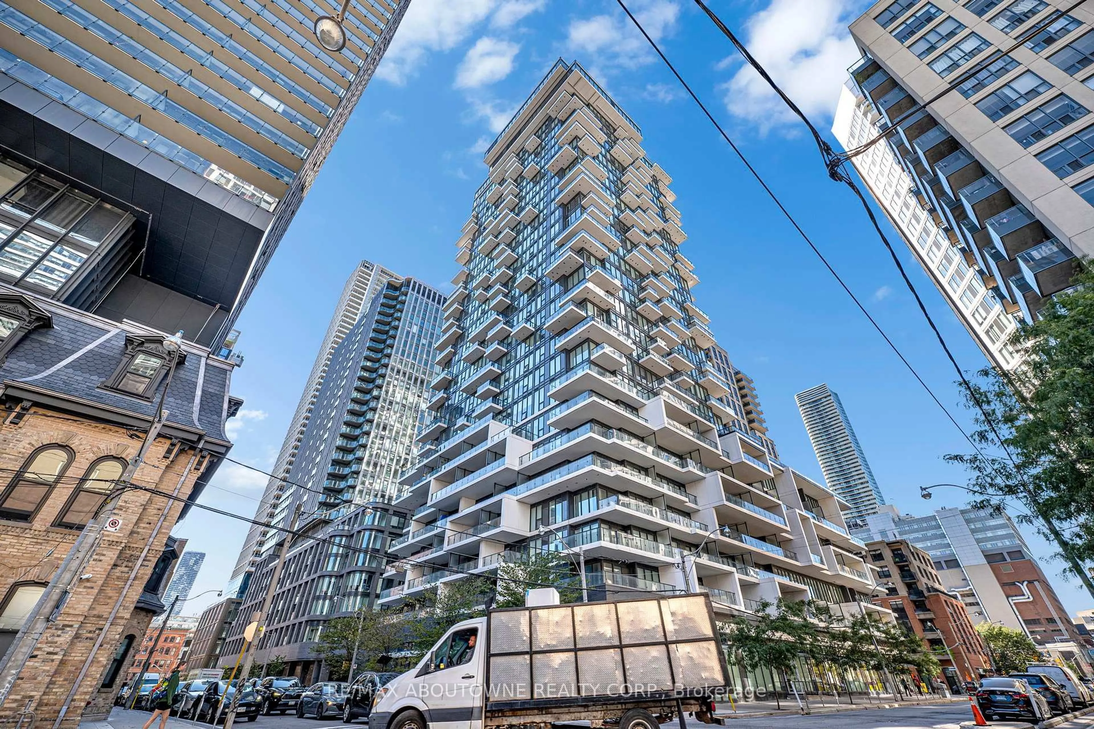 Patio, city buildings view from balcony for 77 Shuter St #1516, Toronto Ontario M5B 0B8