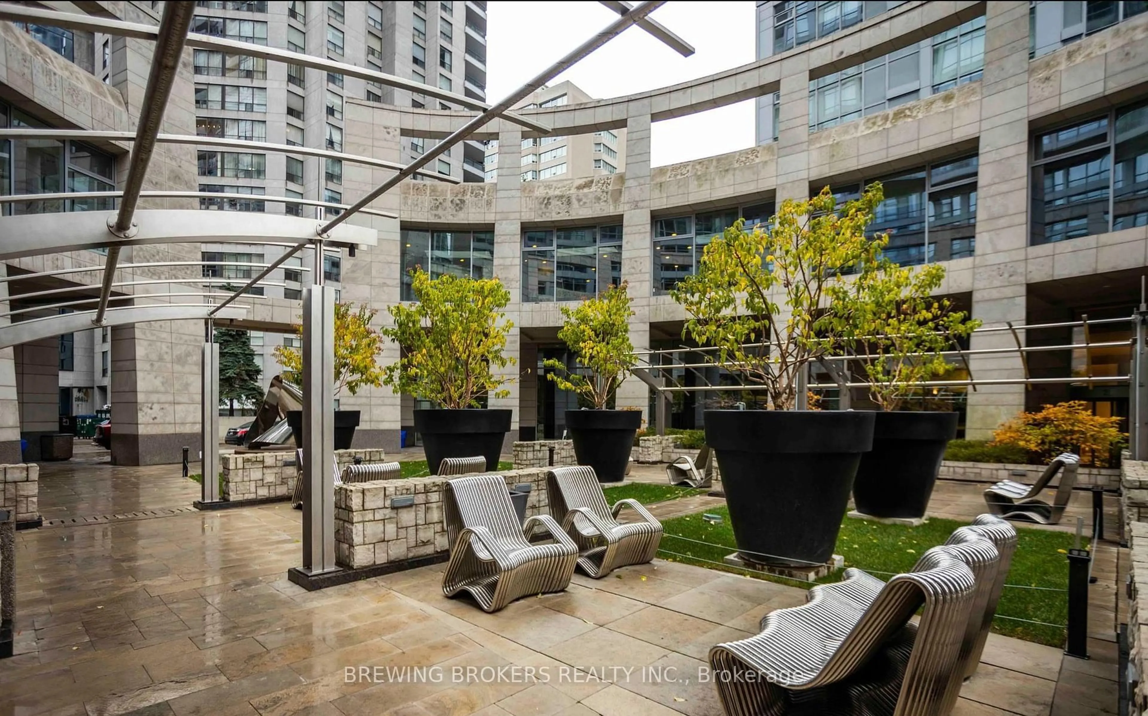 Patio, city buildings view from balcony for 2191 Yonge St #2409, Toronto Ontario M4S 2B1