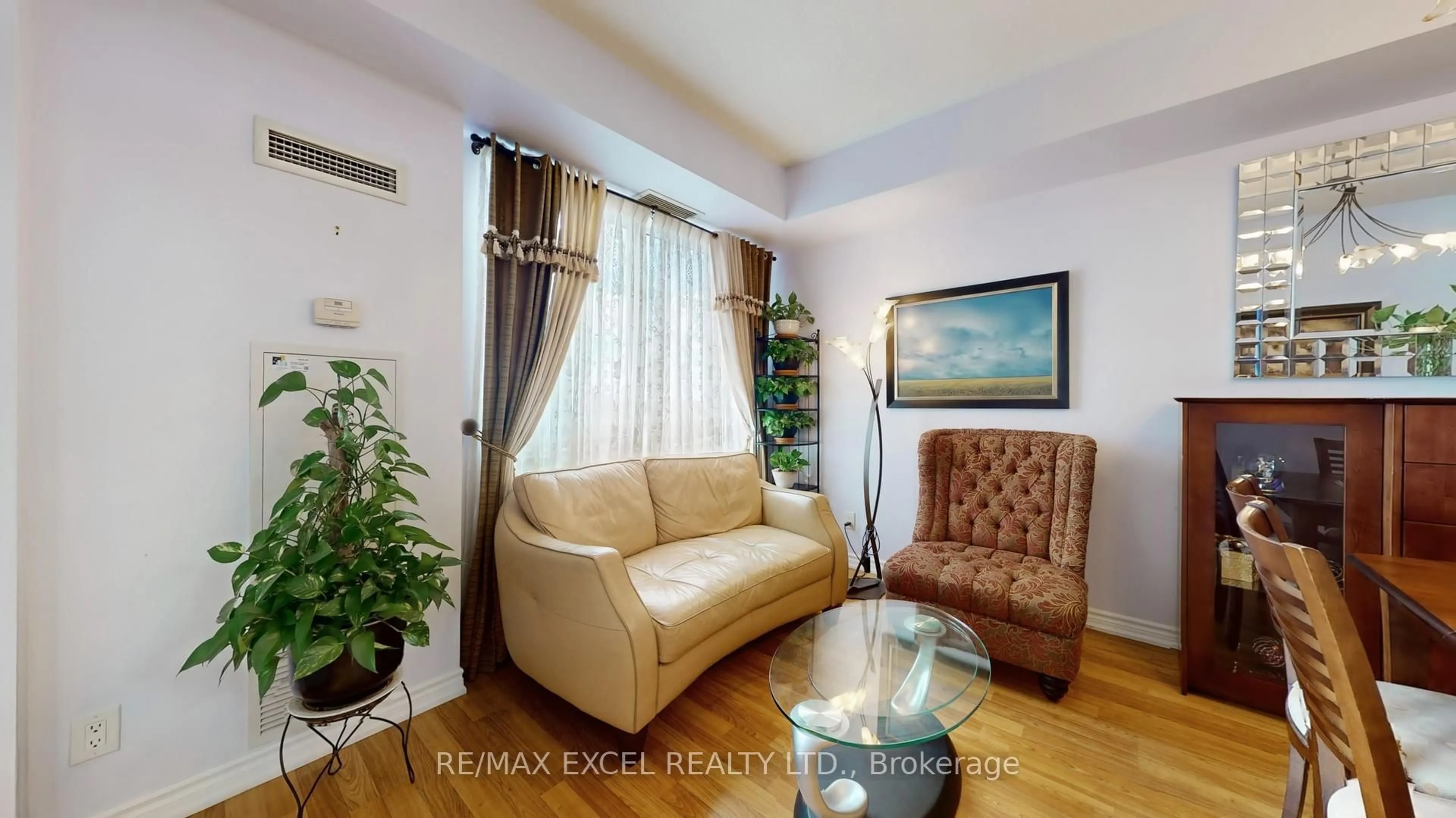 Living room with furniture, unknown for 135 Wynford Dr #1204, Toronto Ontario M3C 0J4