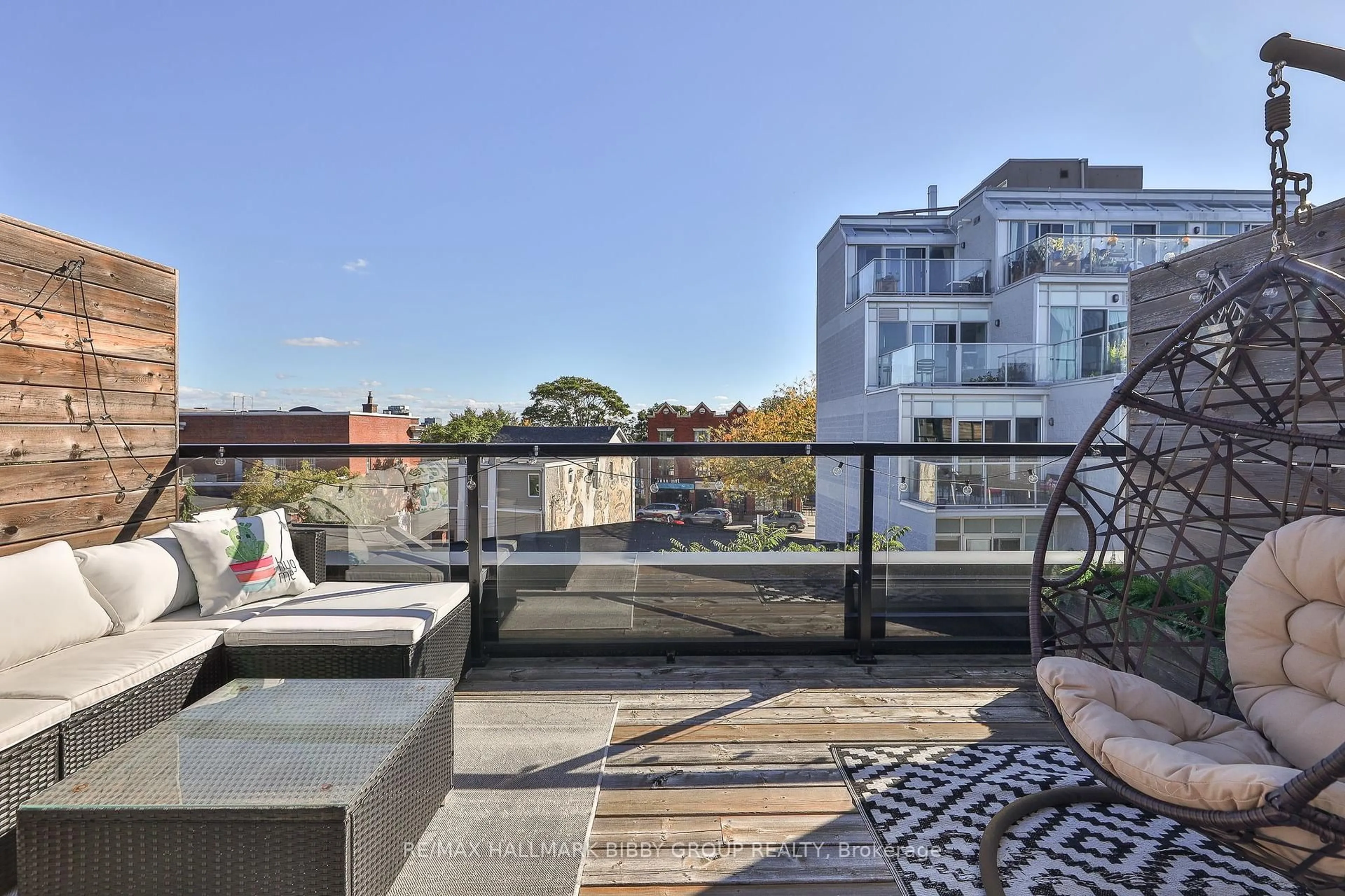 Patio, city buildings view from balcony for 284 Brock Ave #20, Toronto Ontario M6K 2M4