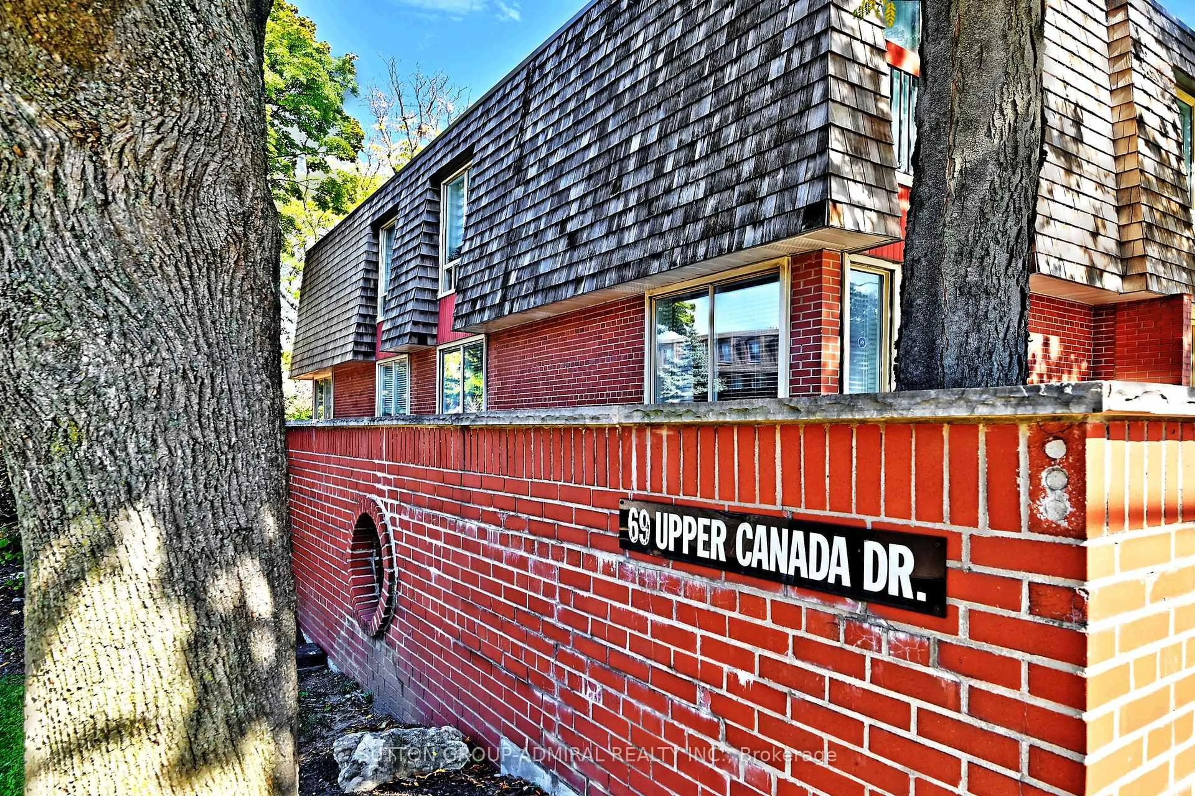 Home with brick exterior material, street for 69 Upper Canada Dr #1, Toronto Ontario M2P 2A3