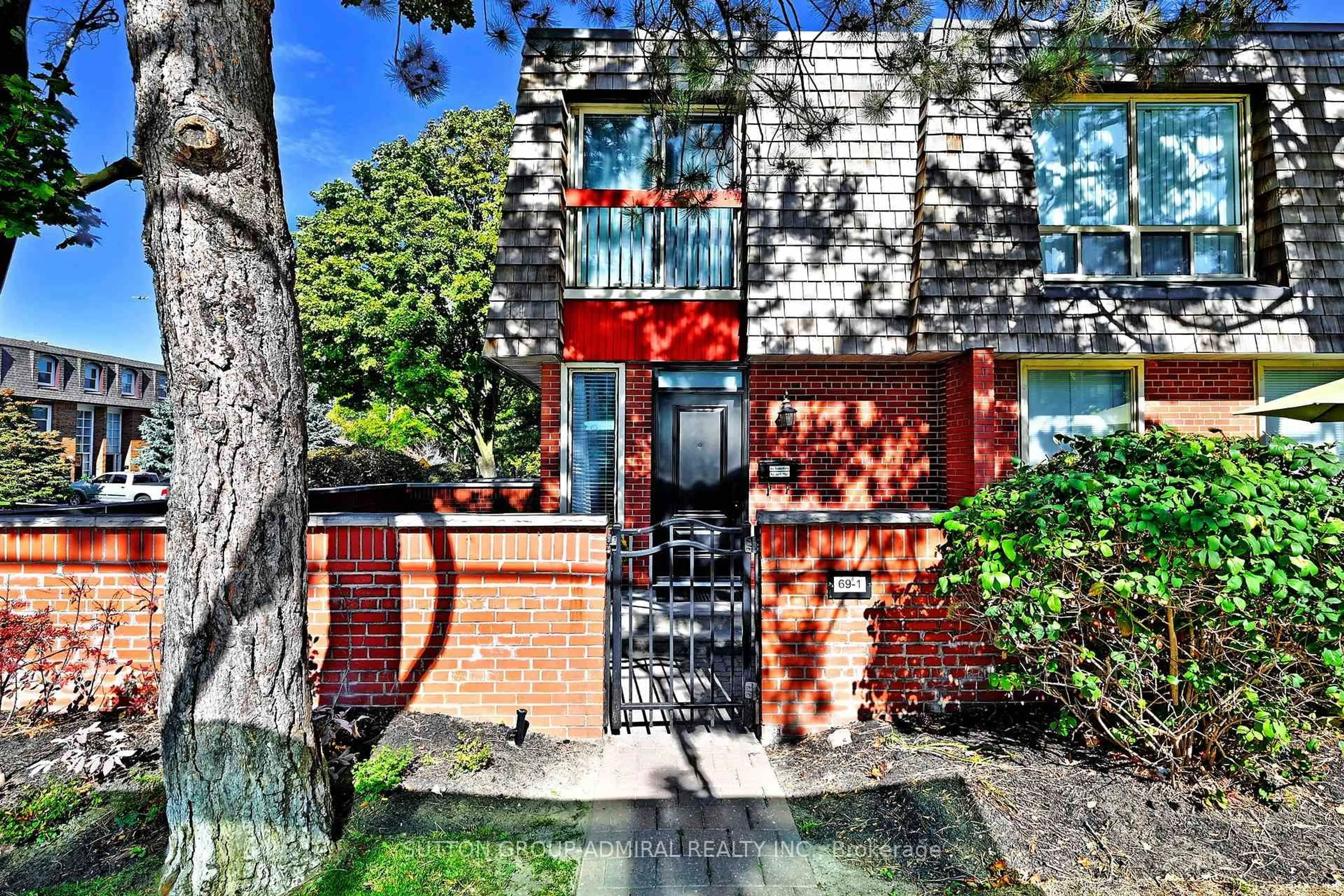 Home with brick exterior material, street for 69 Upper Canada Dr #1, Toronto Ontario M2P 2A3