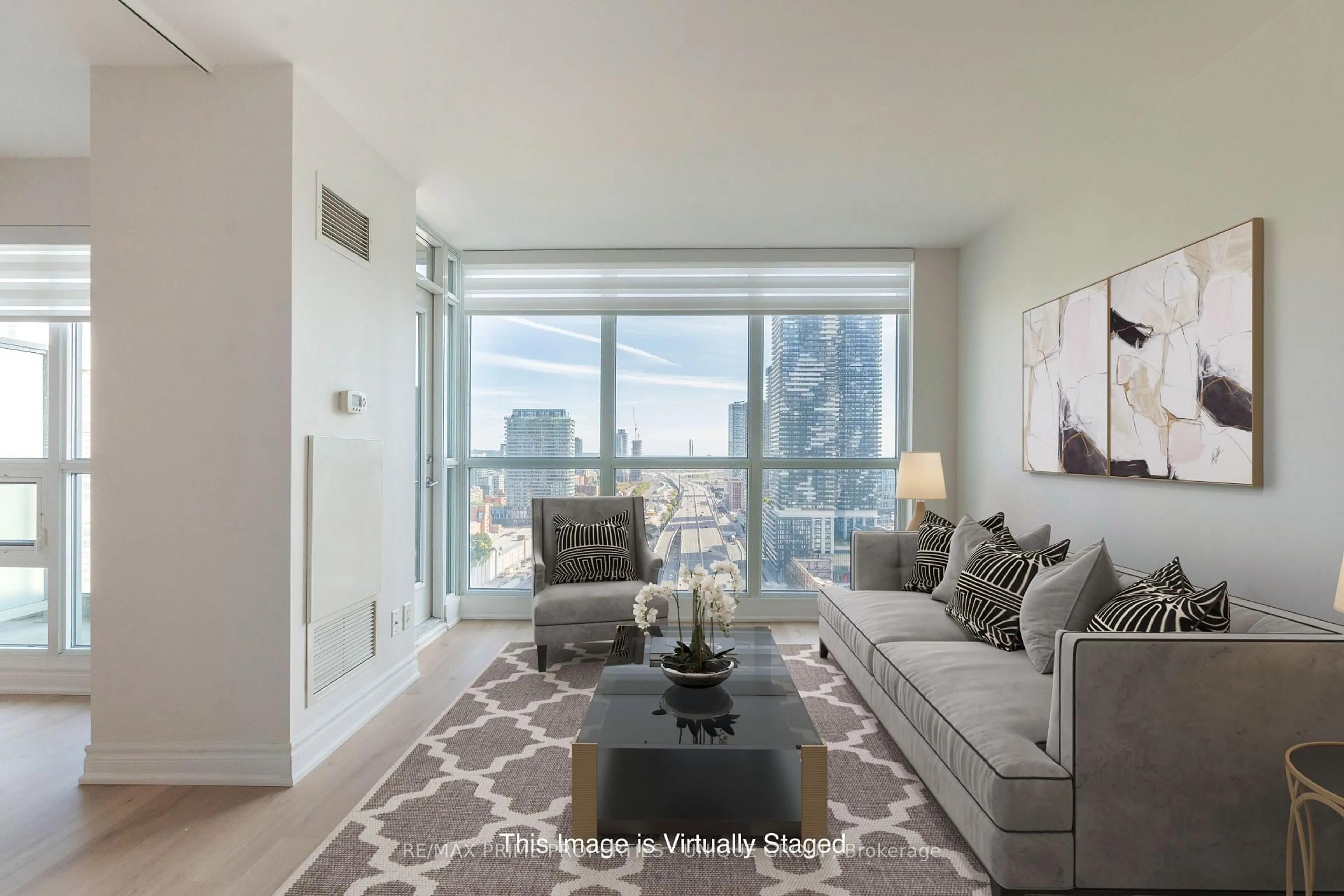 Living room with furniture, unknown for 18 Yonge St #2706, Toronto Ontario M5E 1Z8