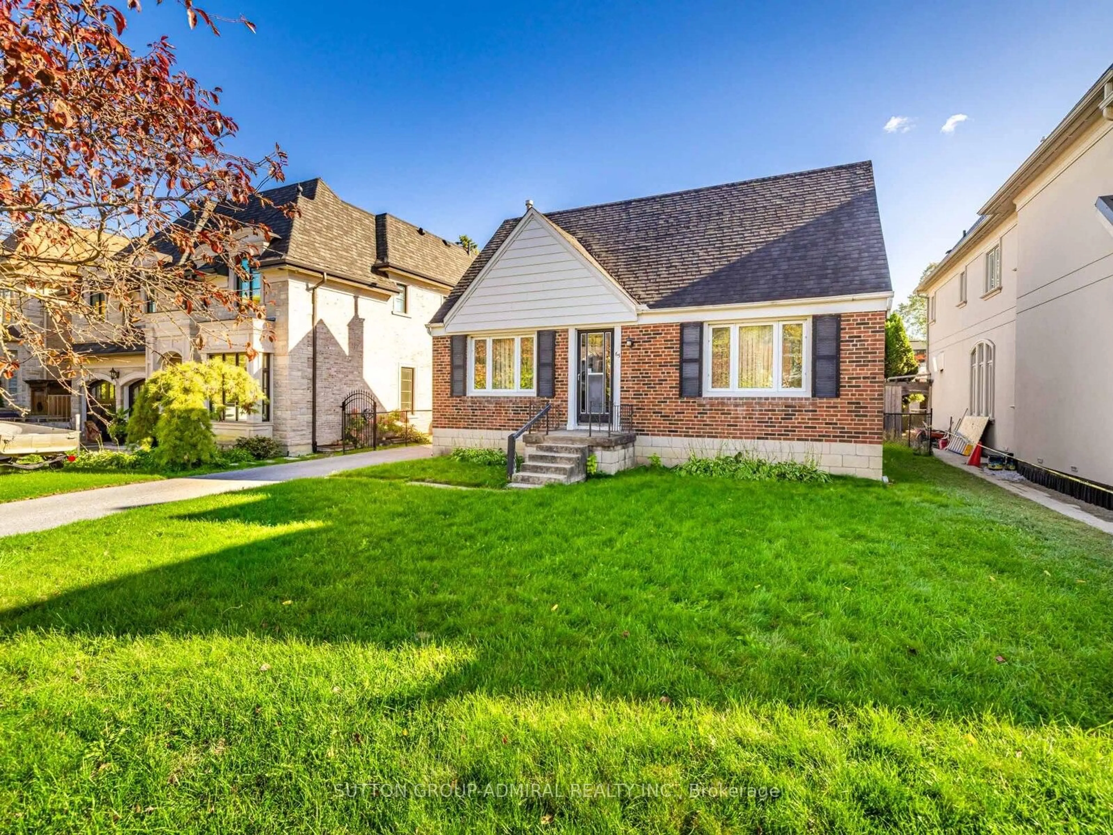 Home with brick exterior material, street for 65 Lurgan Dr, Toronto Ontario M2R 1K7