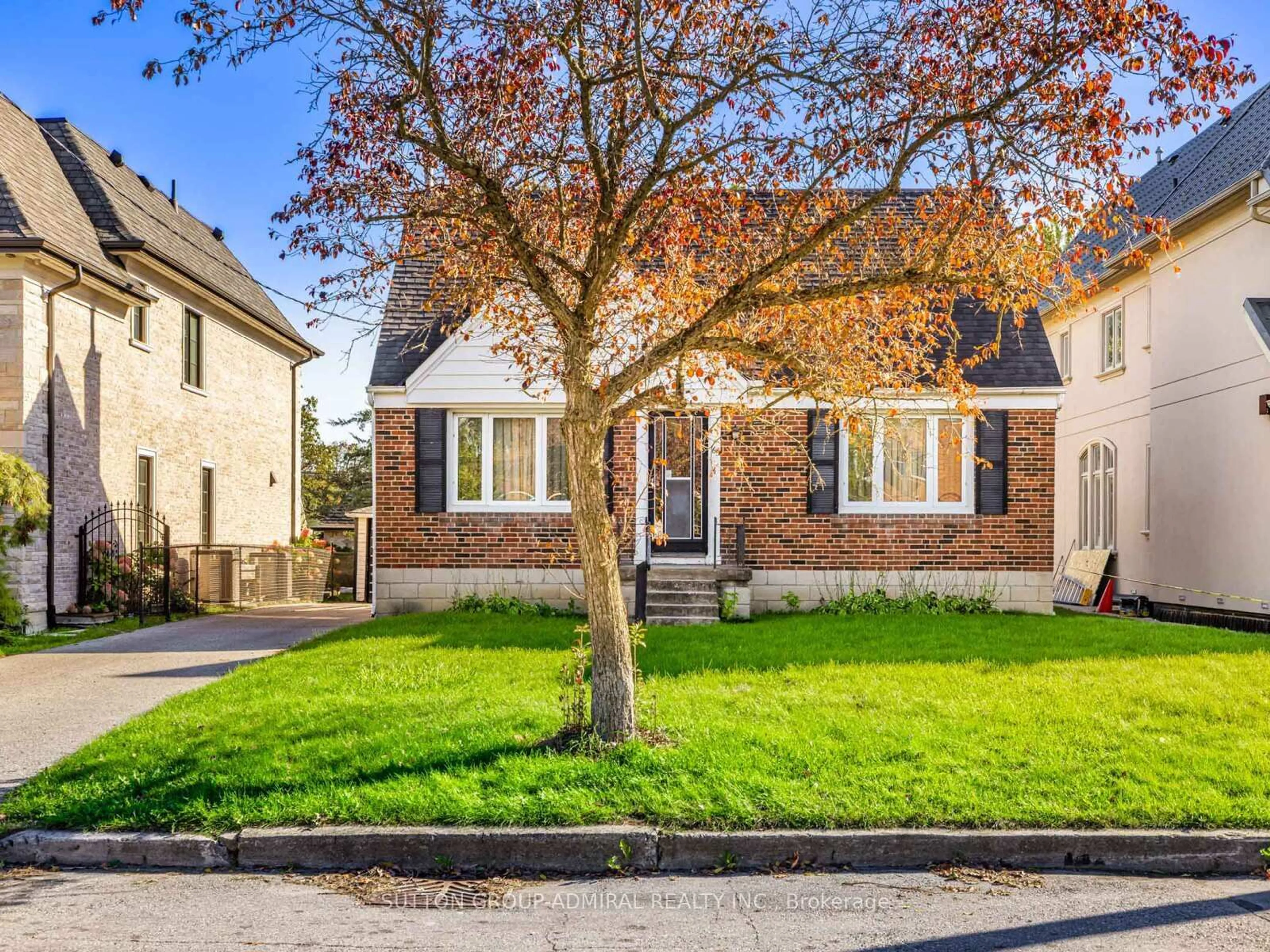 Home with brick exterior material, street for 65 Lurgan Dr, Toronto Ontario M2R 1K7