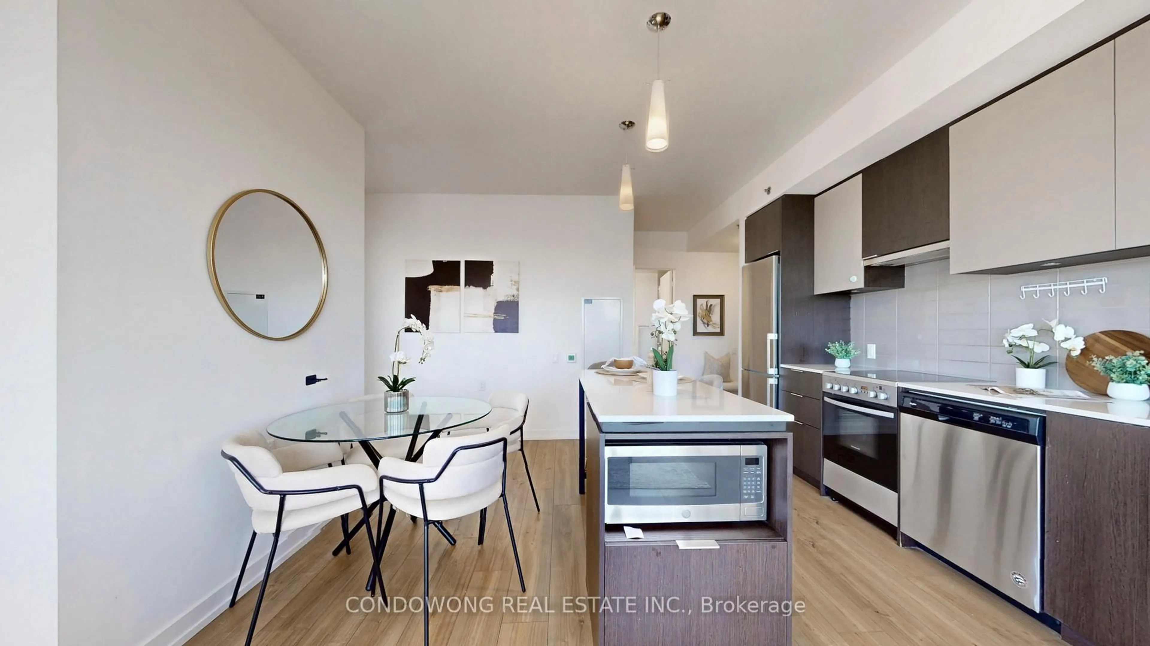 Open concept kitchen, wood/laminate floor for 203 College St #1704, Toronto Ontario M5T 0C8