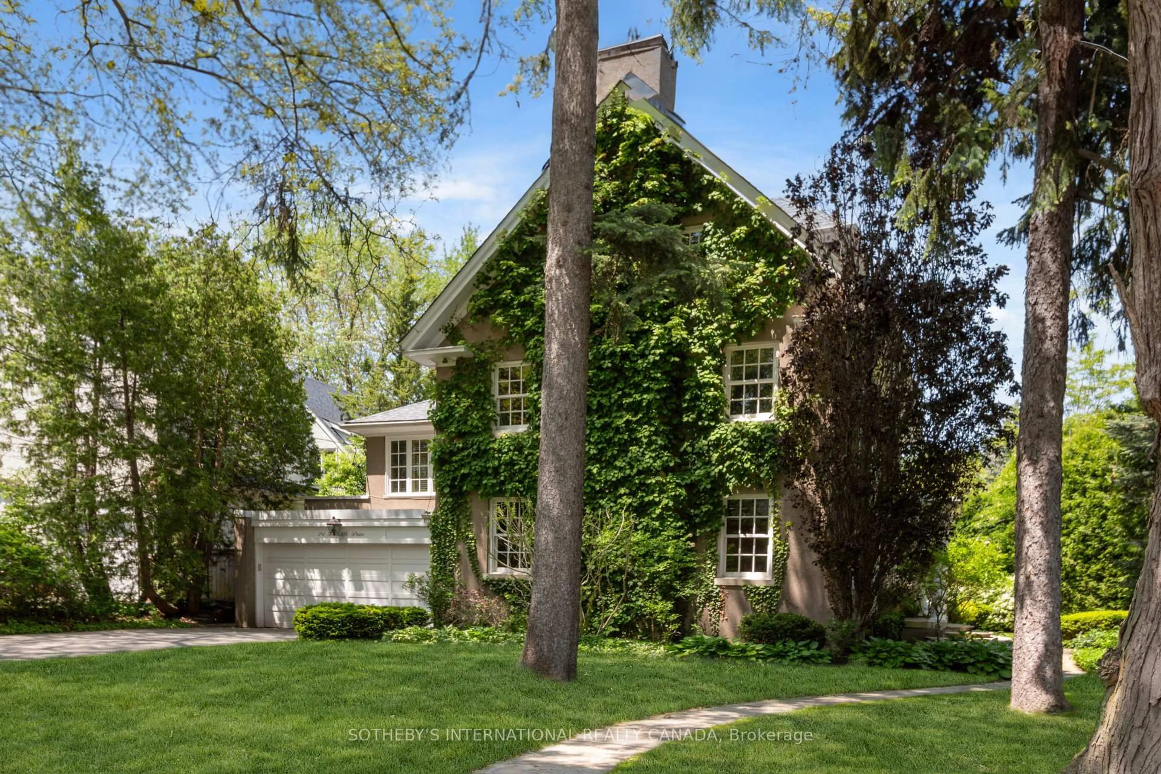 Home with brick exterior material, street for 24 Doncliffe Dr, Toronto Ontario M4N 2E6