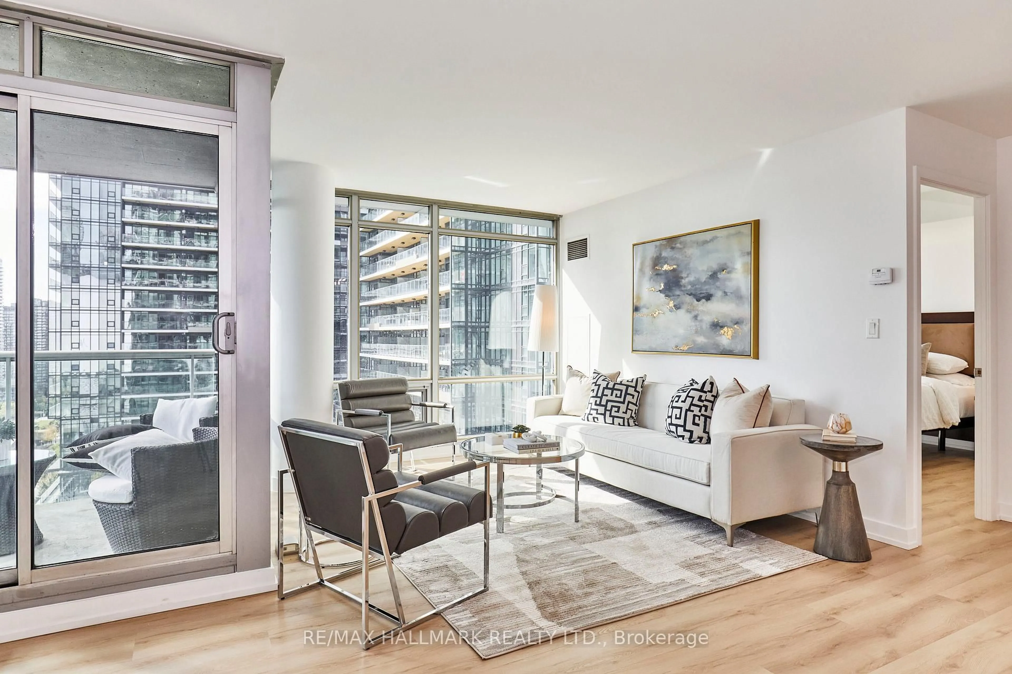 Living room with furniture, wood/laminate floor for 81 Navy Wharf Crt #2306, Toronto Ontario M5V 3S2