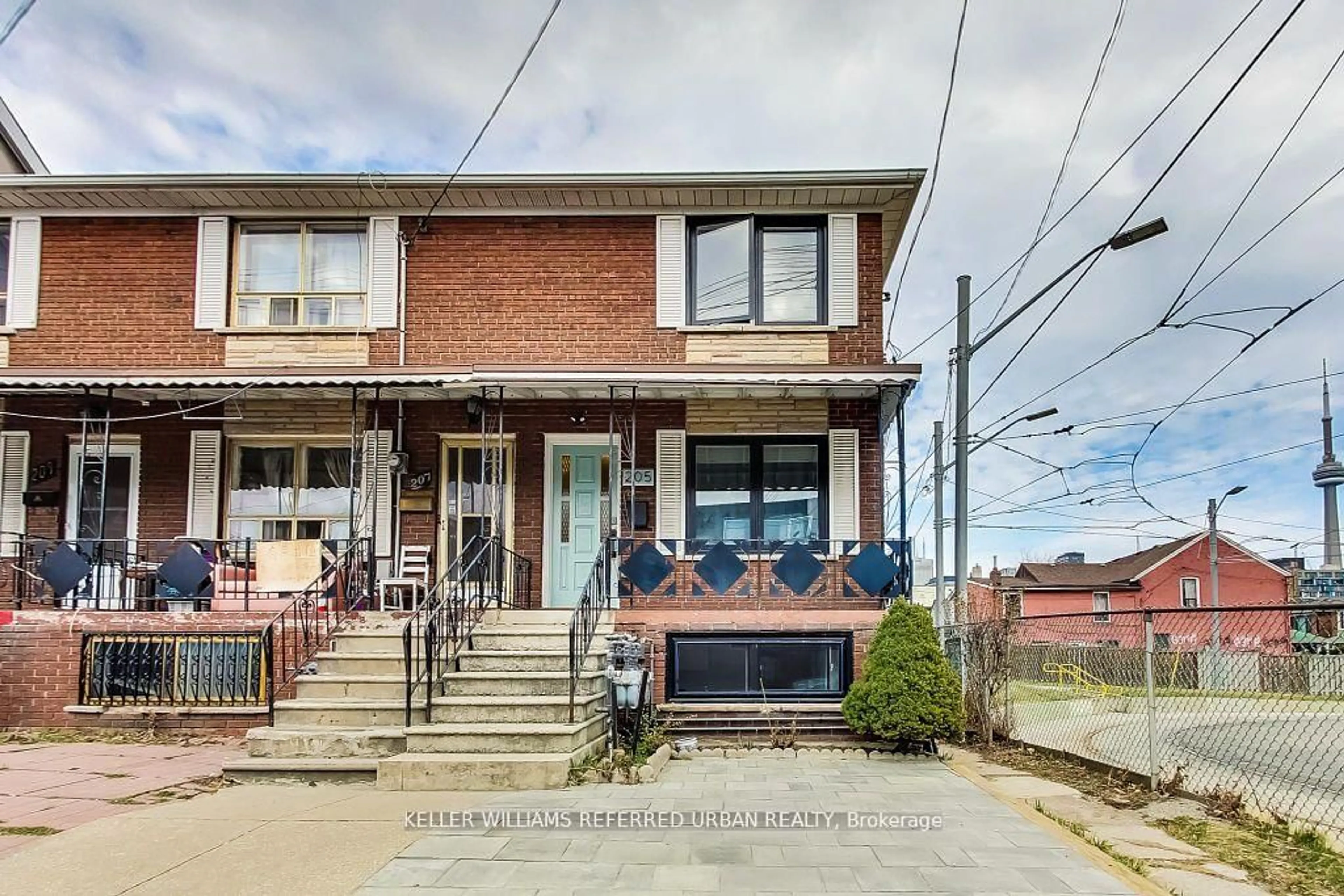Home with brick exterior material, street for 205 Bathurst St, Toronto Ontario M5T 2S1