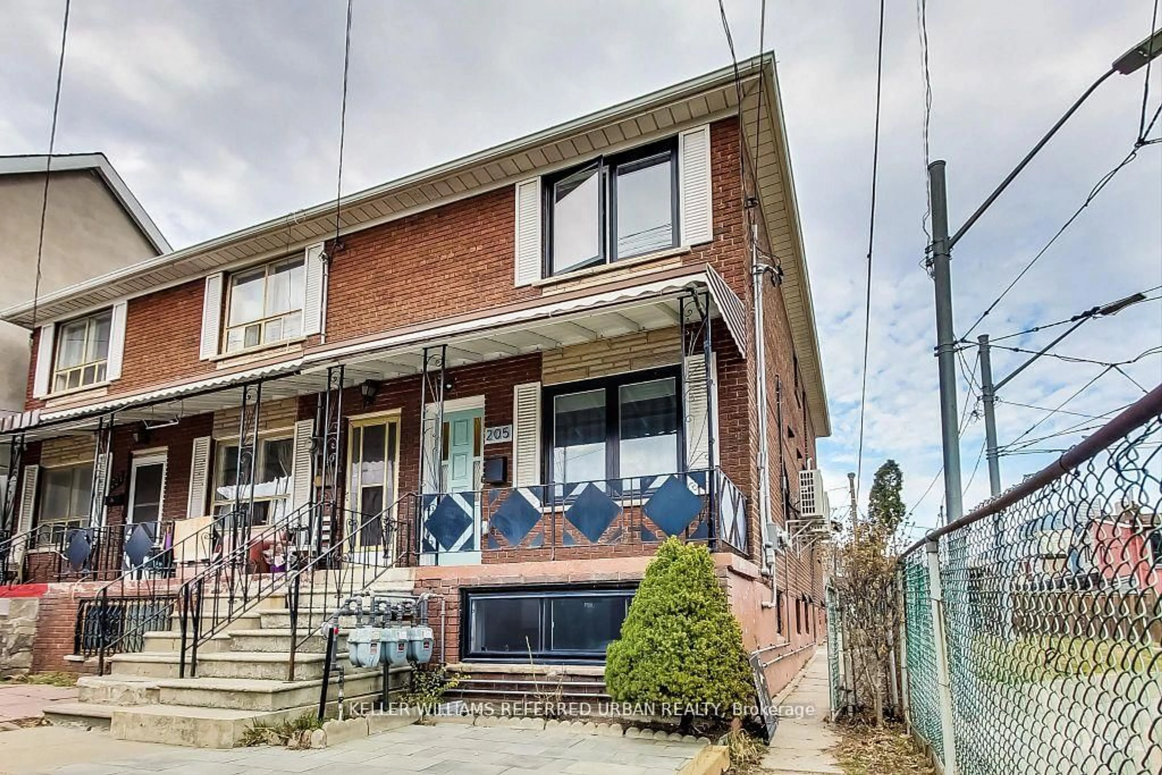 Home with brick exterior material, street for 205 Bathurst St, Toronto Ontario M5T 2S1