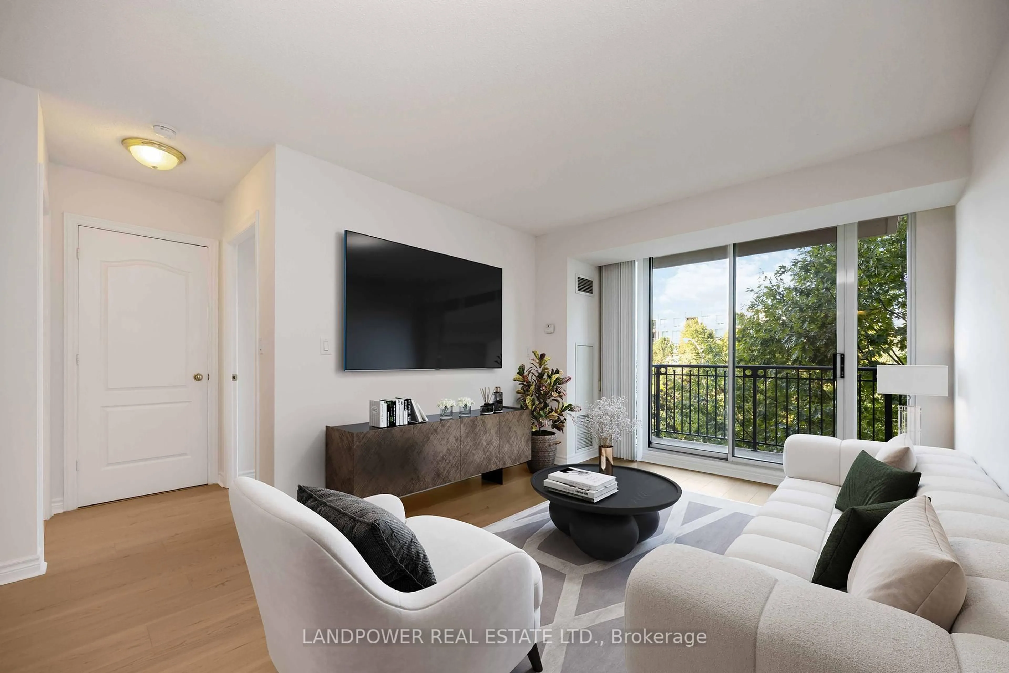 Living room with furniture, wood/laminate floor for 38 William Carson Cres #621, Toronto Ontario M2P 2A1