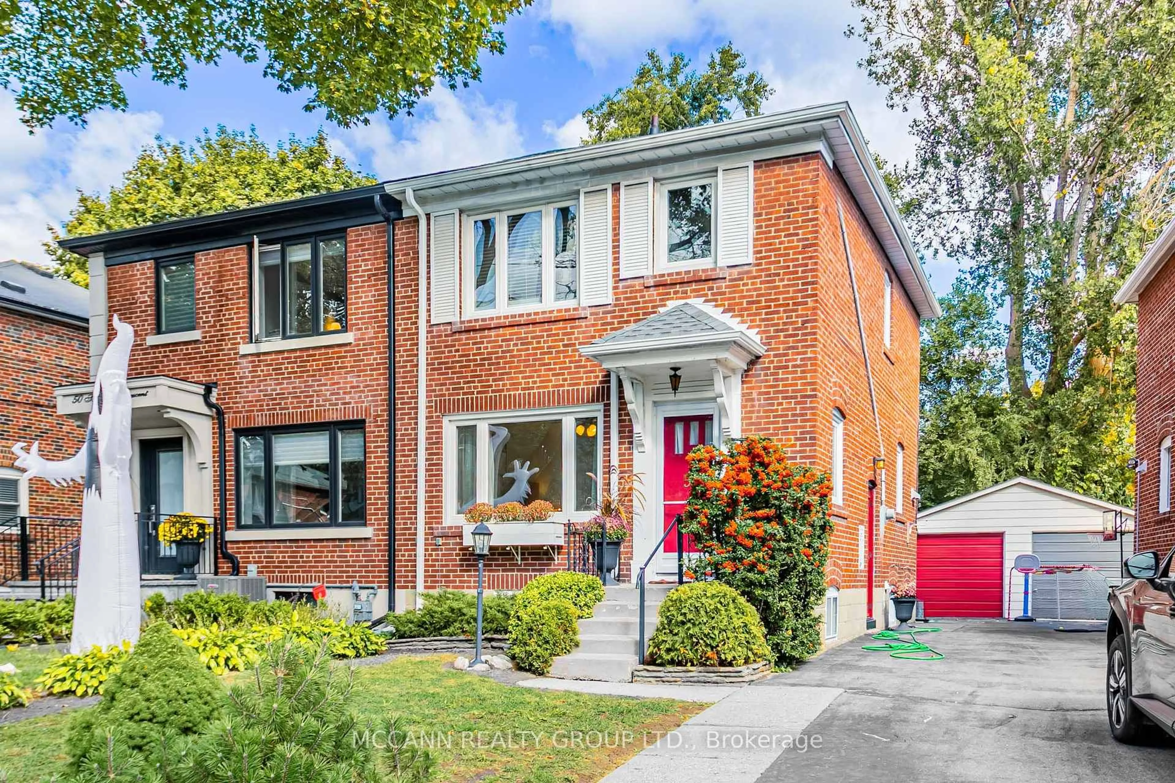 Home with brick exterior material, street for 52 Thursfield Cres, Toronto Ontario M4G 2N5