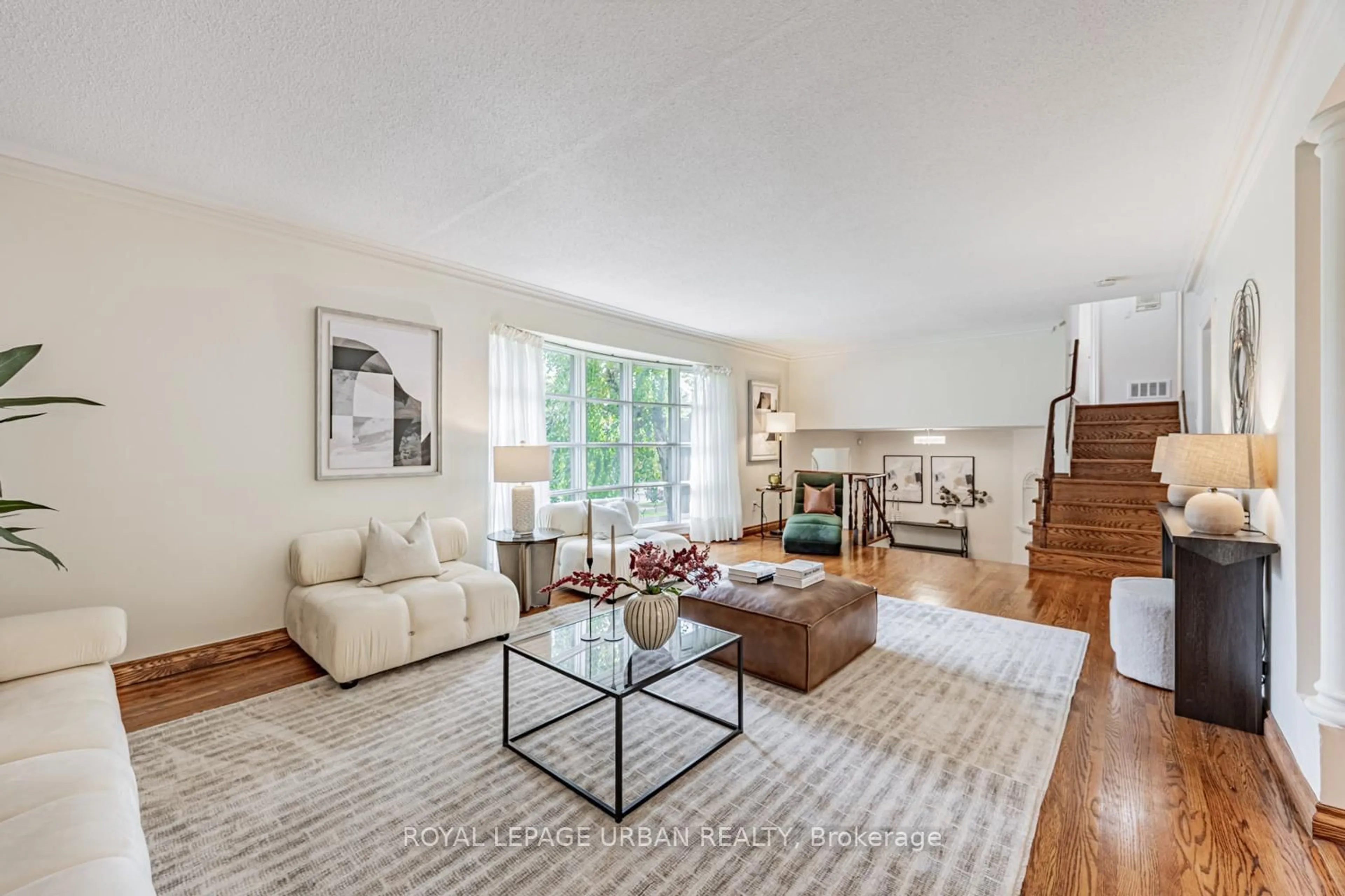 Living room with furniture, unknown for 206 Sloane Ave, Toronto Ontario M4A 2C6
