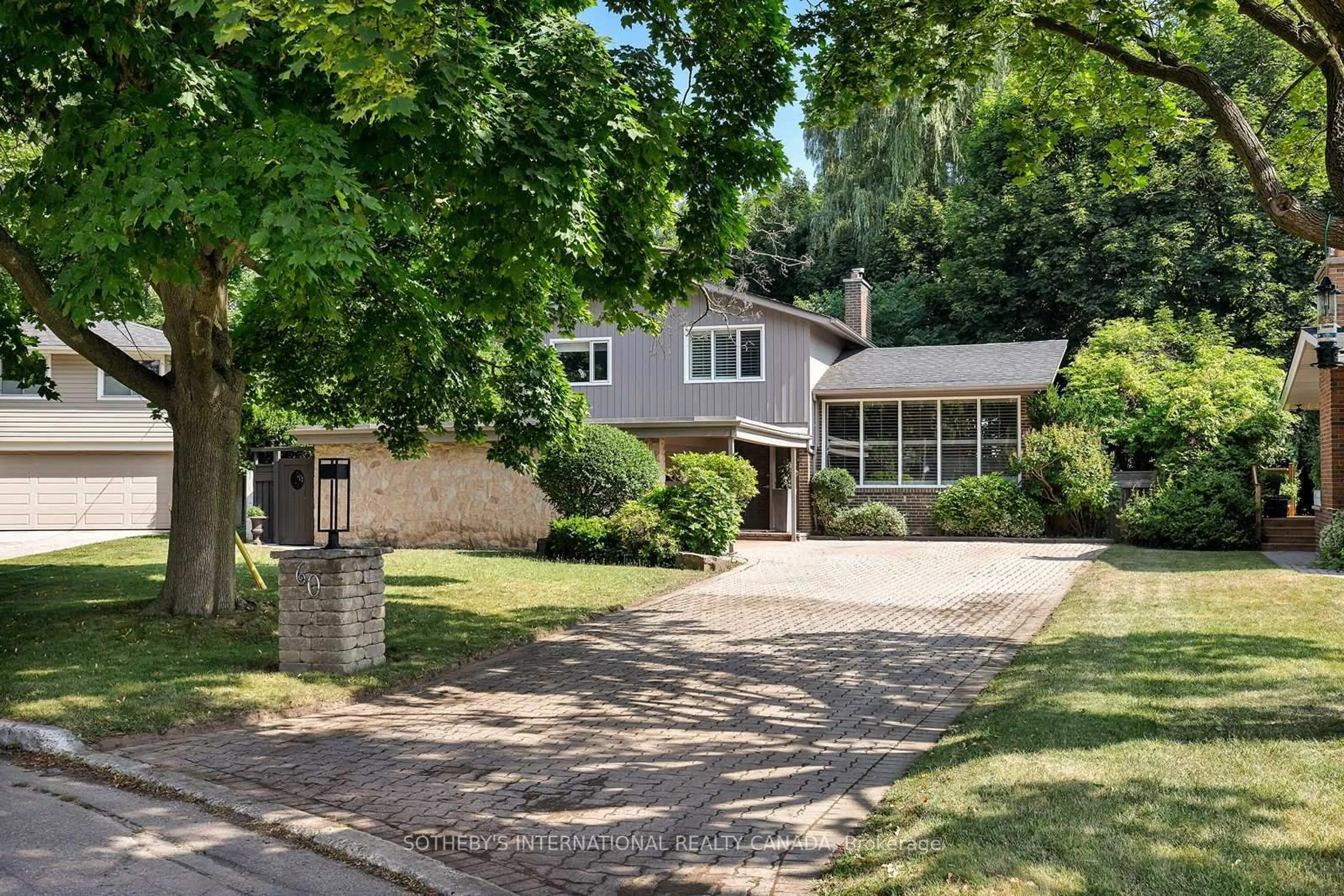 Home with brick exterior material, street for 60 Doonaree Dr, Toronto Ontario M3A 1M6
