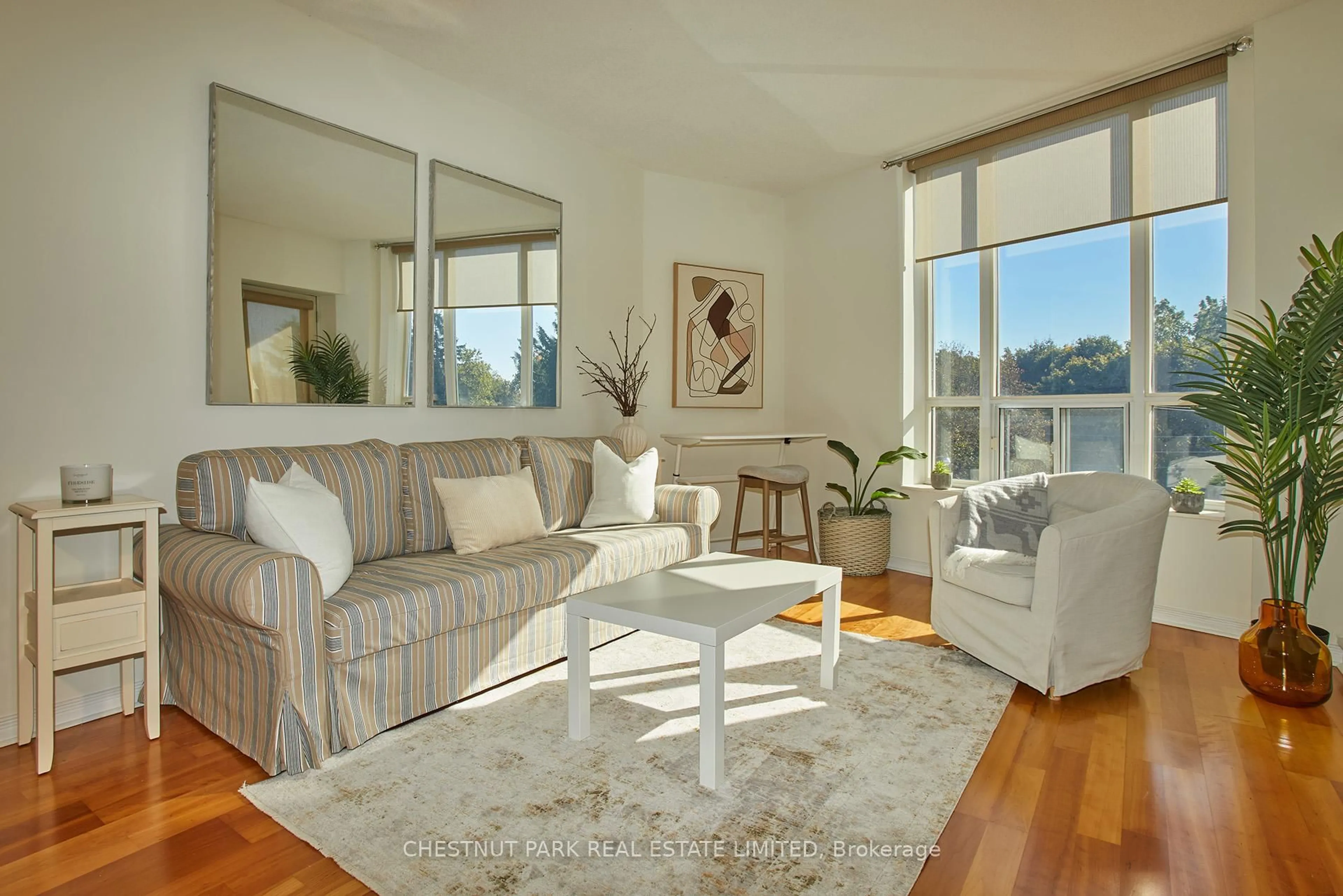 Living room with furniture, wood/laminate floor for 451 Rosewell Ave #413, Toronto Ontario M4R 2H8