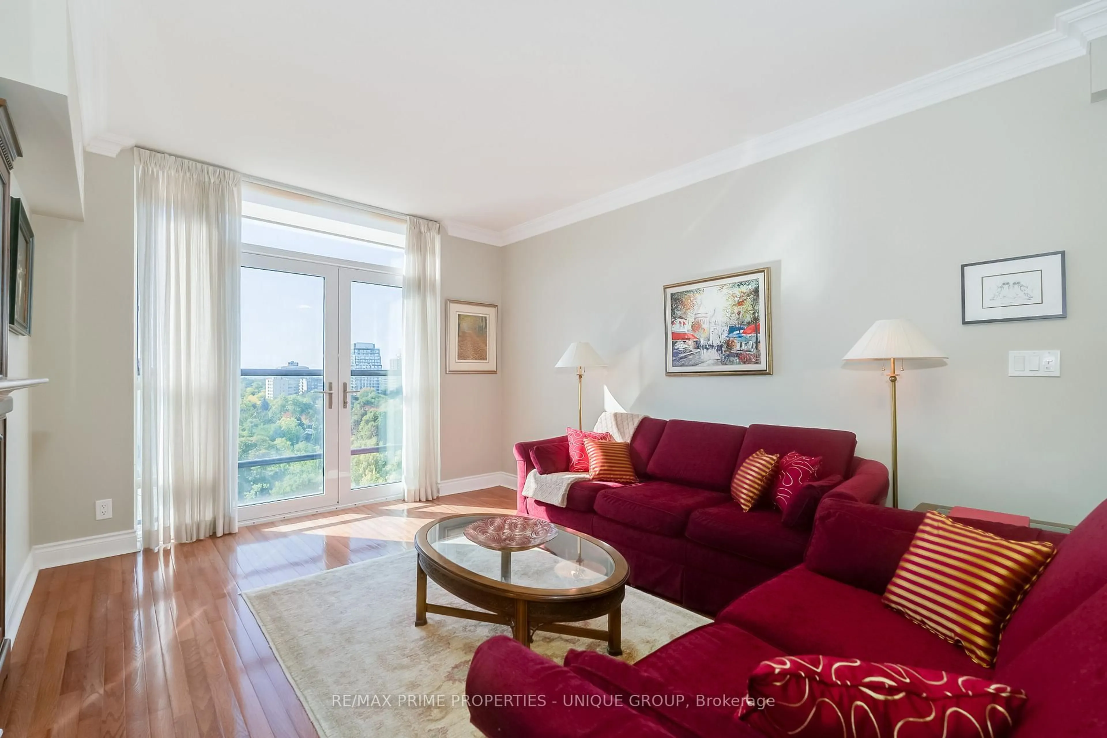 Living room with furniture, wood/laminate floor for 10 Delisle Ave #1404, Toronto Ontario M4V 3C6