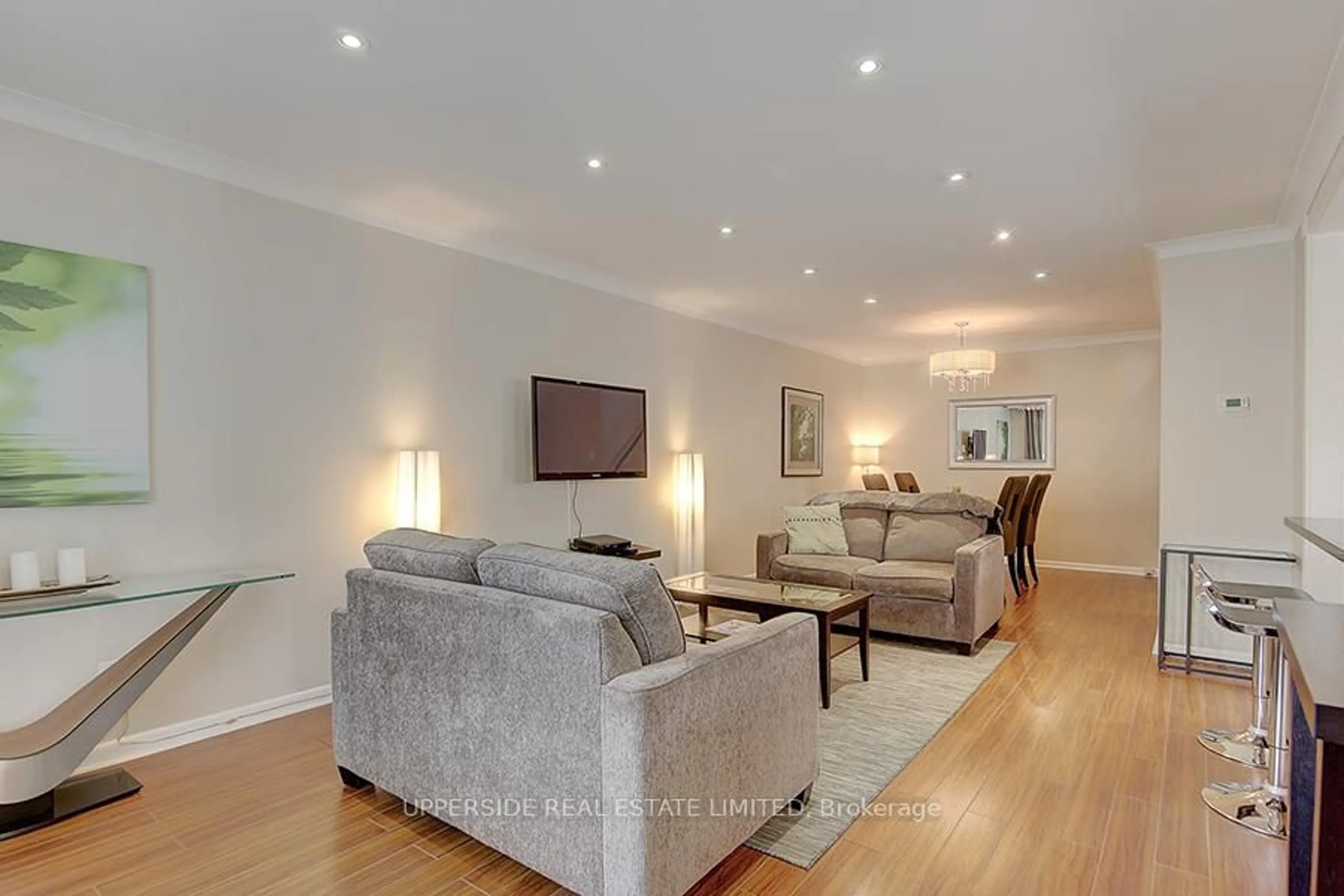 Living room with furniture, wood/laminate floor for 47 Bessarion Rd, Toronto Ontario M2K 1H8