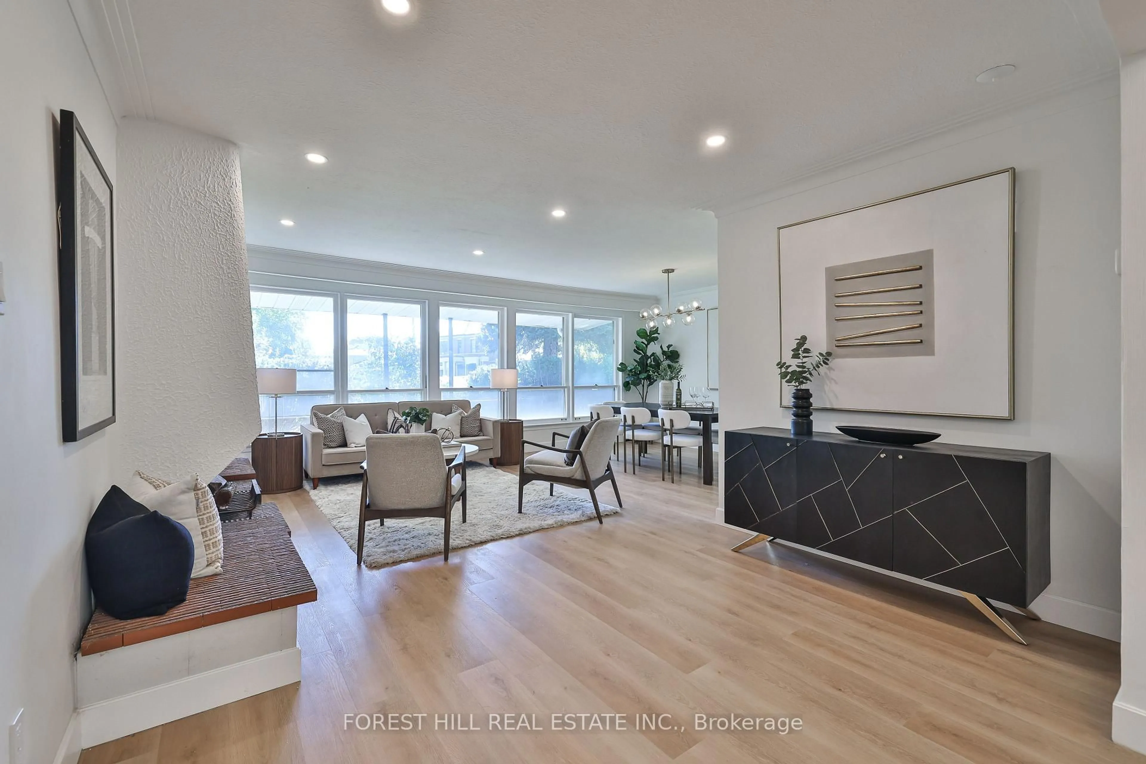 Living room with furniture, wood/laminate floor for 50 Evanston Dr, Toronto Ontario M3H 5P3