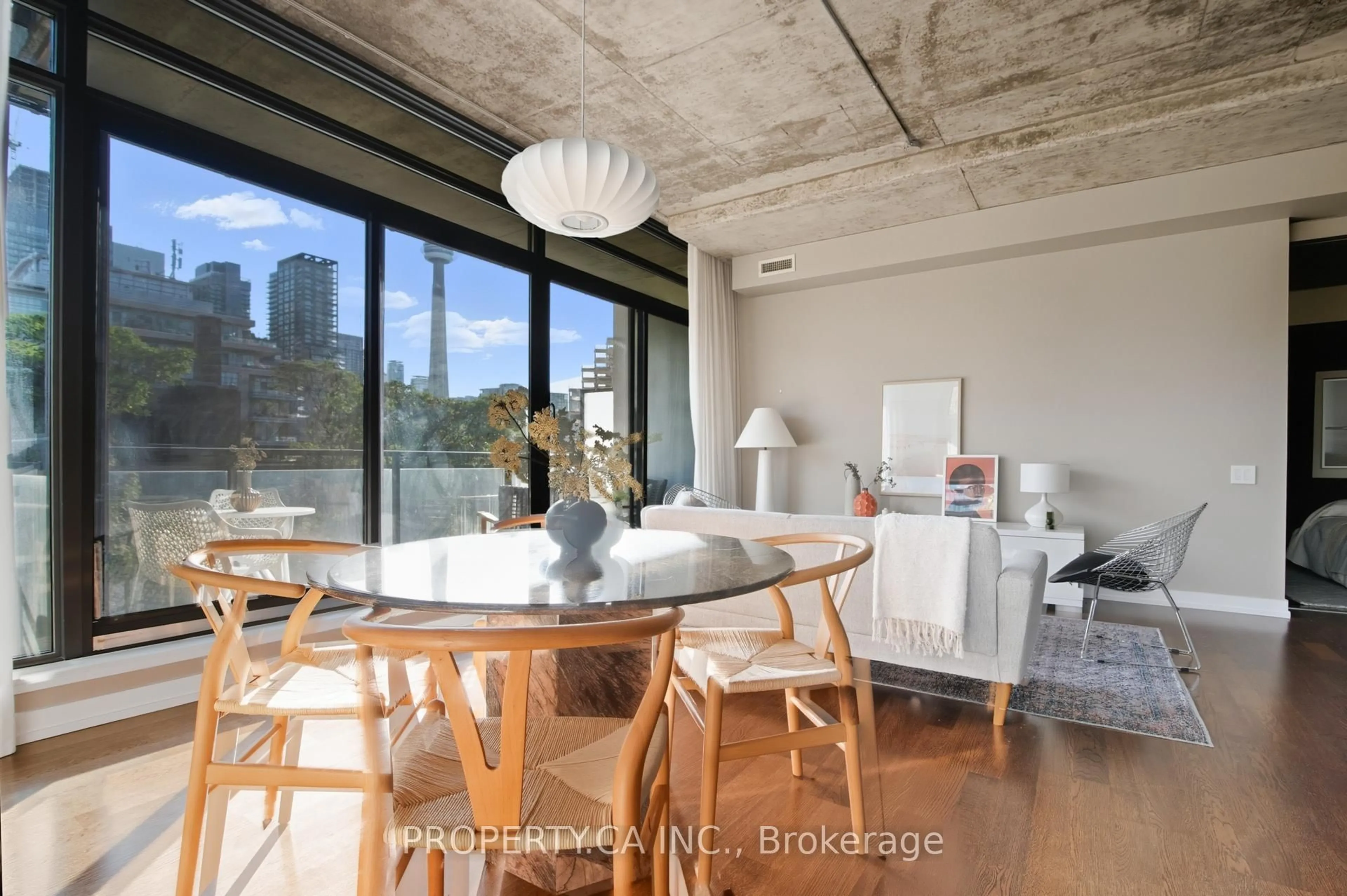 Dining room, cement floor for 10 Morrison St #403, Toronto Ontario M5V 2T8