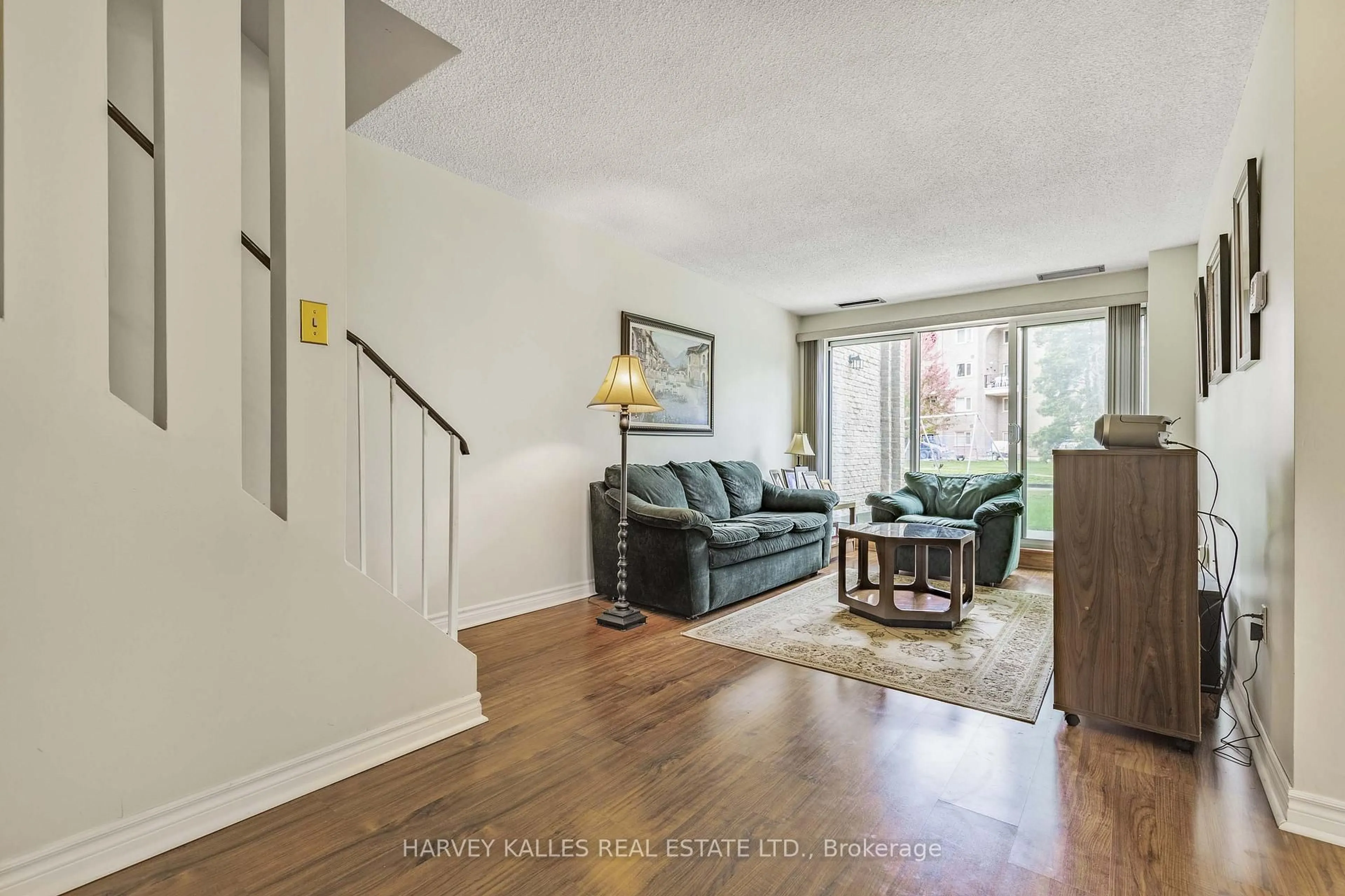 Living room with furniture, unknown for 4001 Don Mills Rd #142, Toronto Ontario M2H 3J8