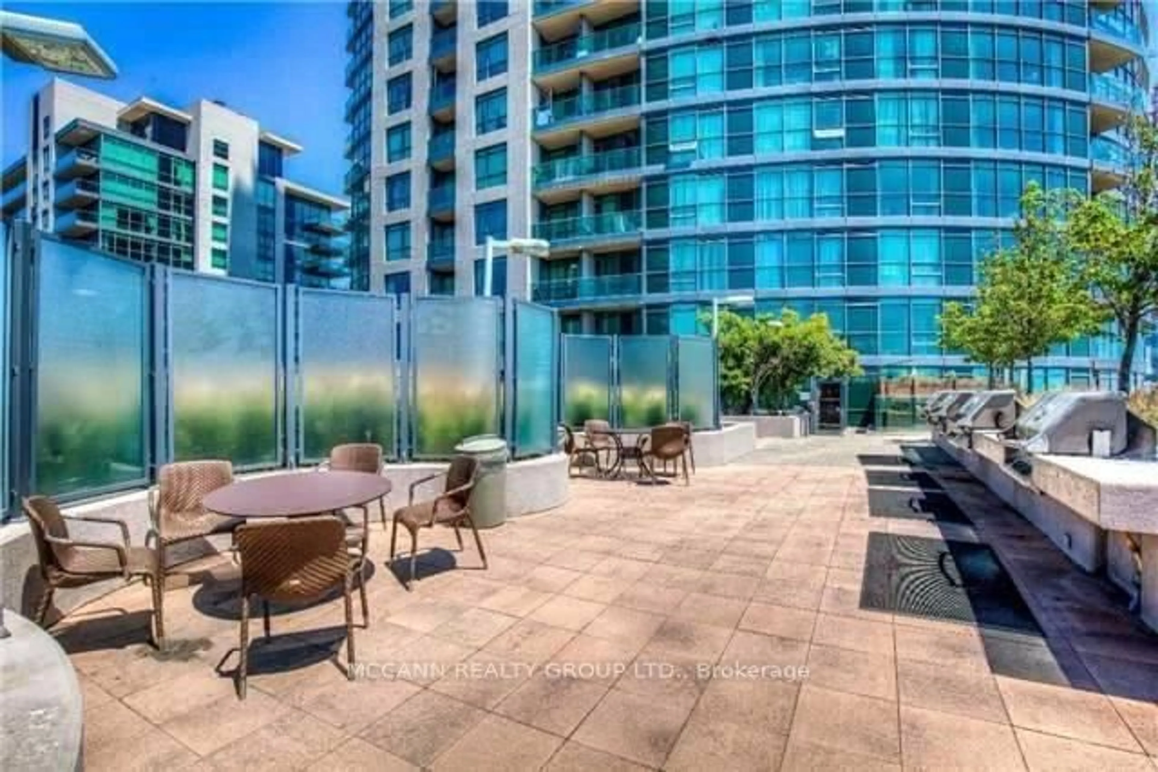 Patio, city buildings view from balcony for 215 Fort York Blvd #3301, Toronto Ontario M5V 4A2