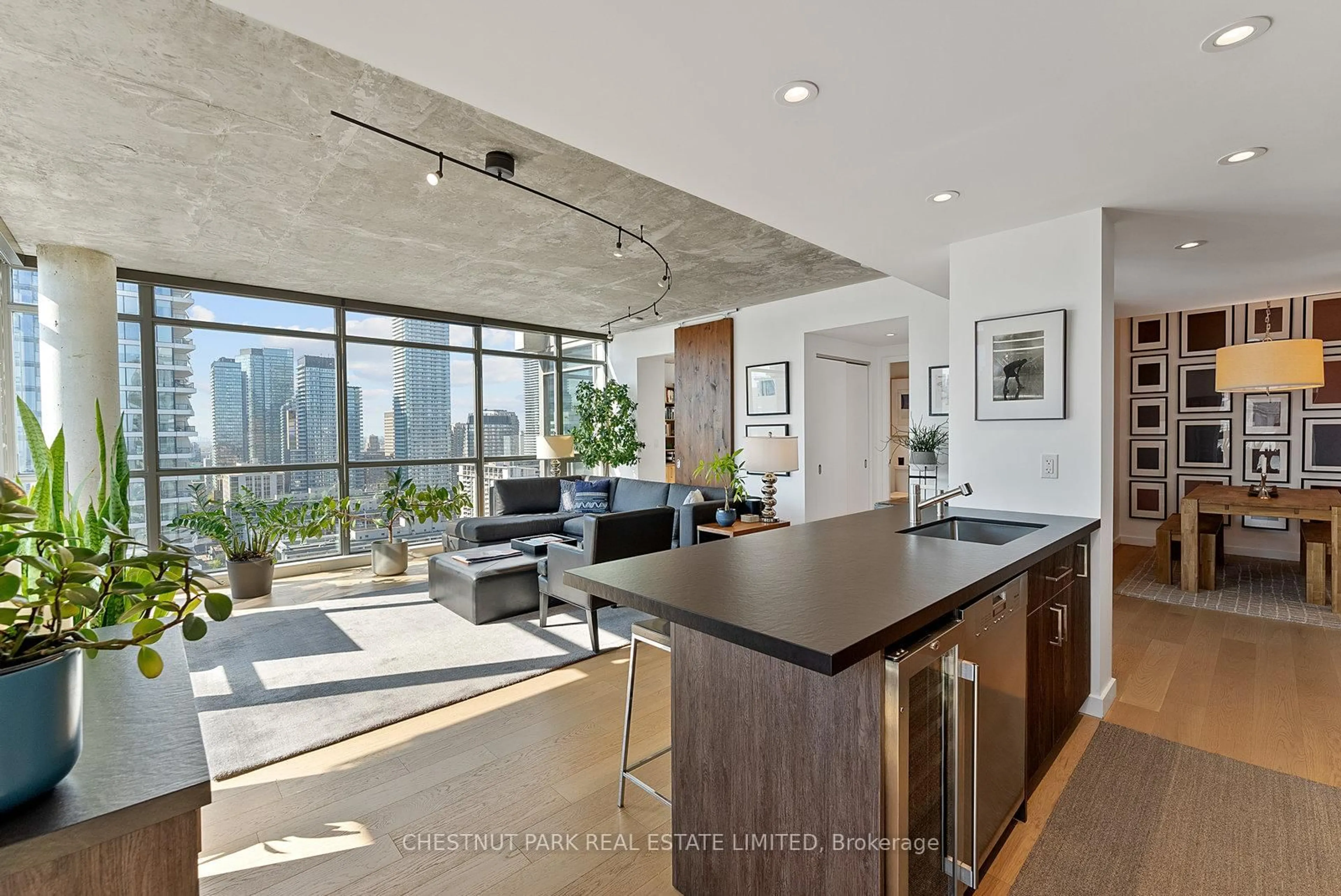 Open concept kitchen, cement floor for 281 Mutual St #2502, Toronto Ontario M4Y 3C4