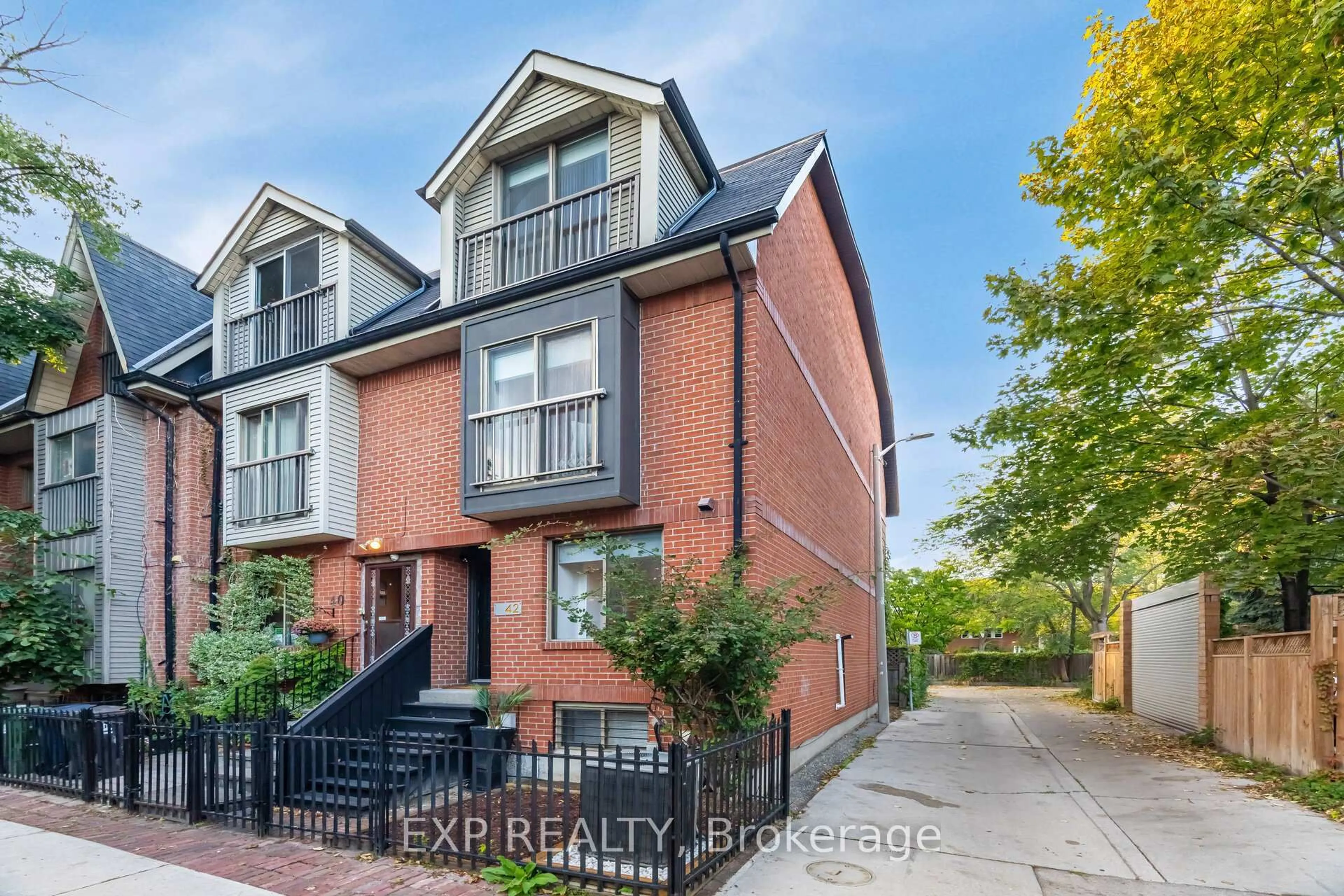 Home with brick exterior material, street for 42 Wascana Ave, Toronto Ontario M5A 1V5