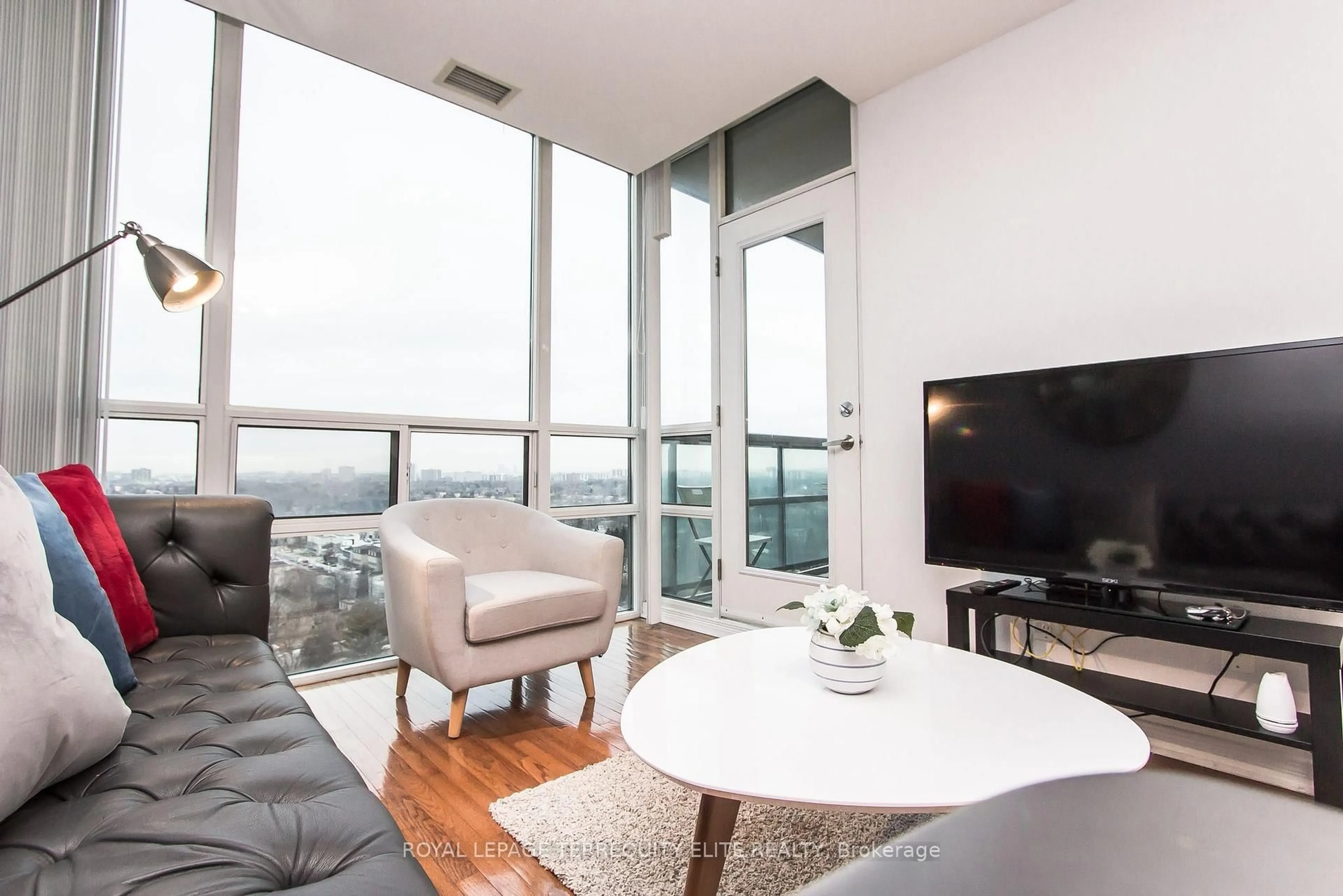 Living room with furniture, wood/laminate floor for 503 Beecroft Rd #2108, Toronto Ontario M2N 0A2