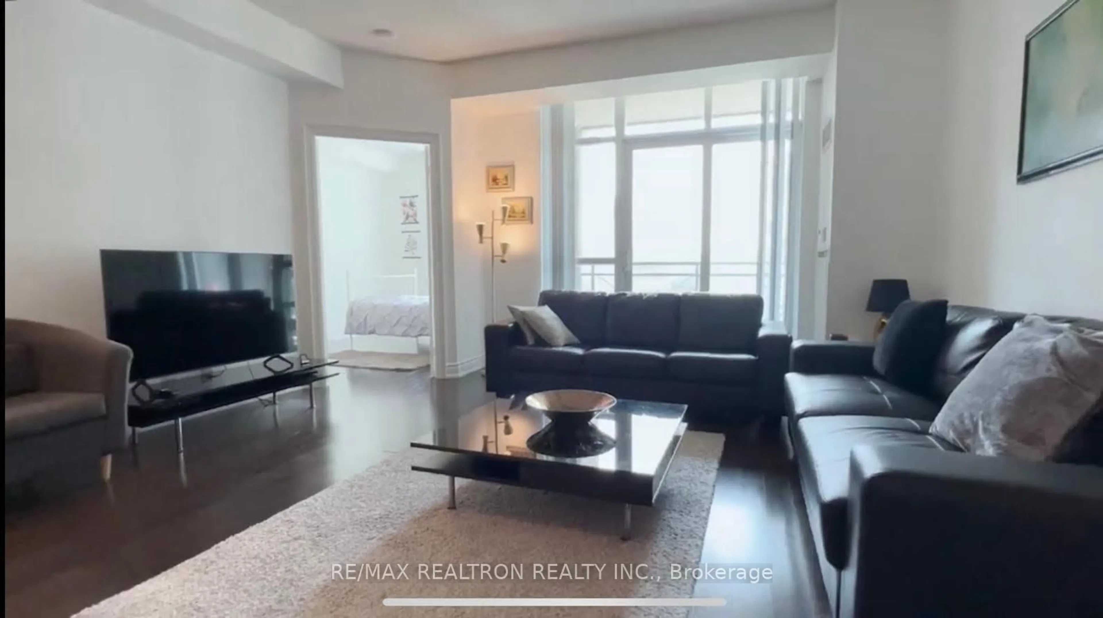 Living room with furniture, unknown for 20 Bloorview Pl #1003, Toronto Ontario M2J 0A6