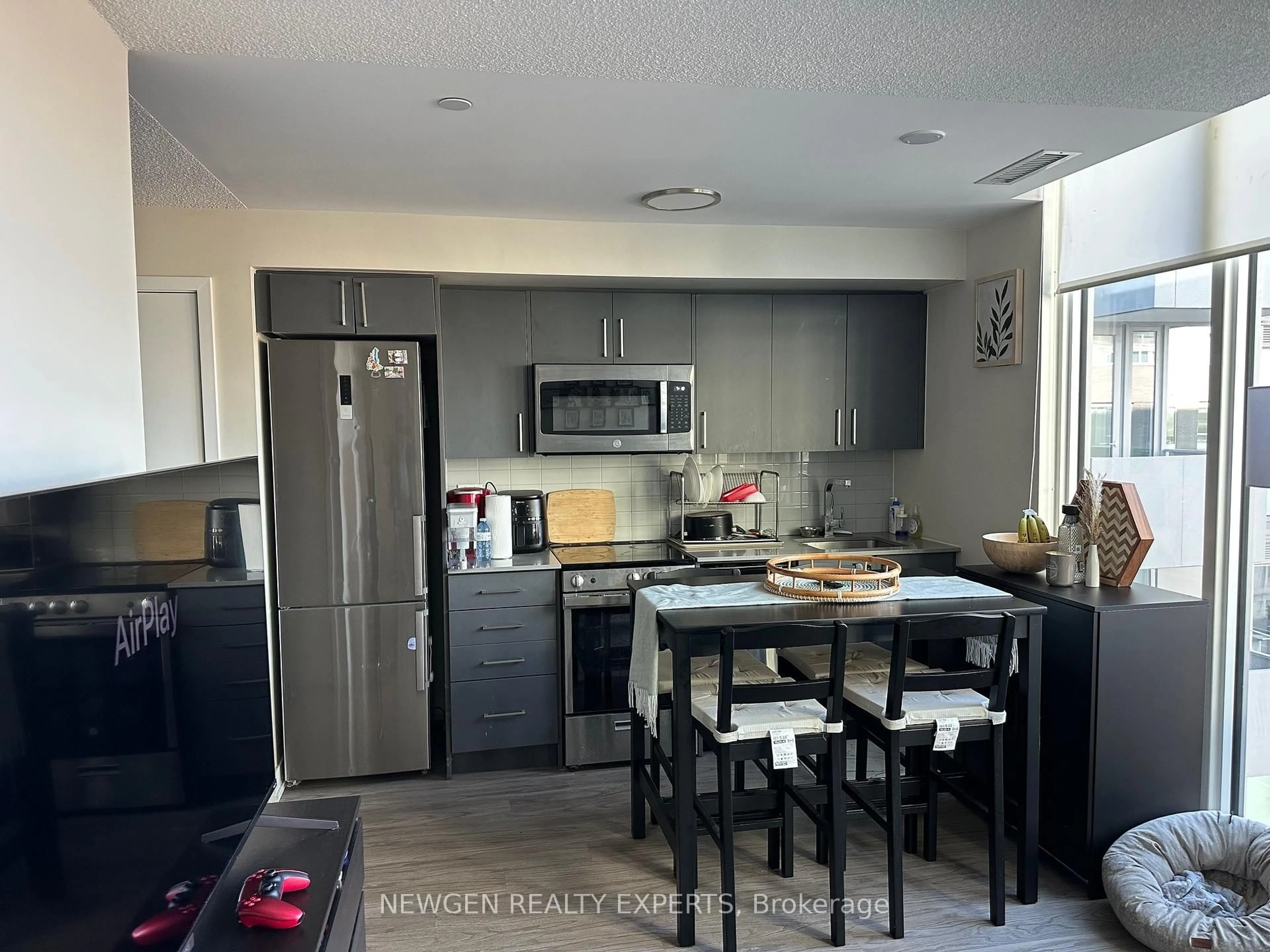 Open concept kitchen, unknown for 38 Monte Kwinter Crt #702, Toronto Ontario M3H 0E2