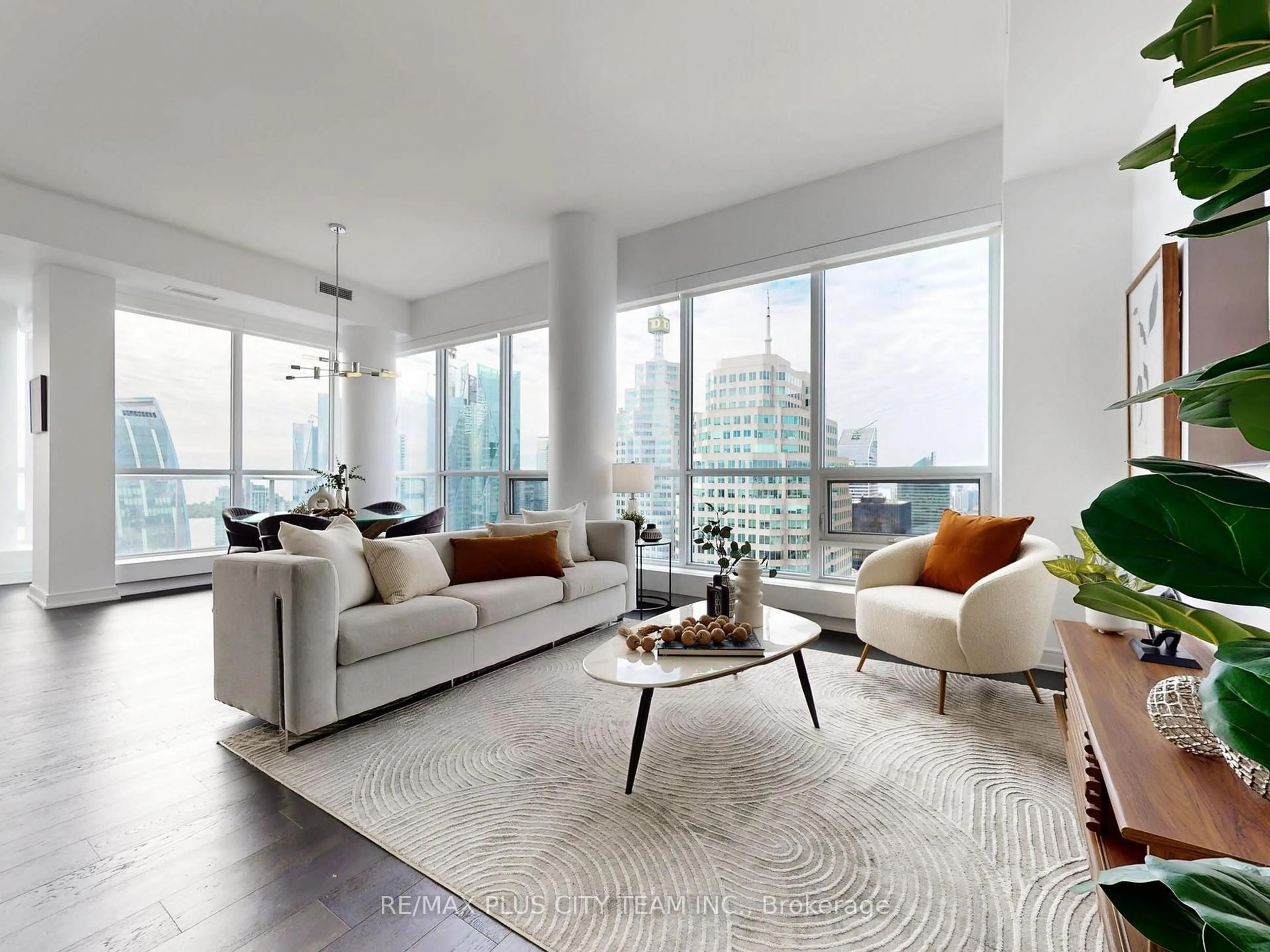 Living room with furniture, unknown for 88 Scott St #5504, Toronto Ontario M5E 0A9