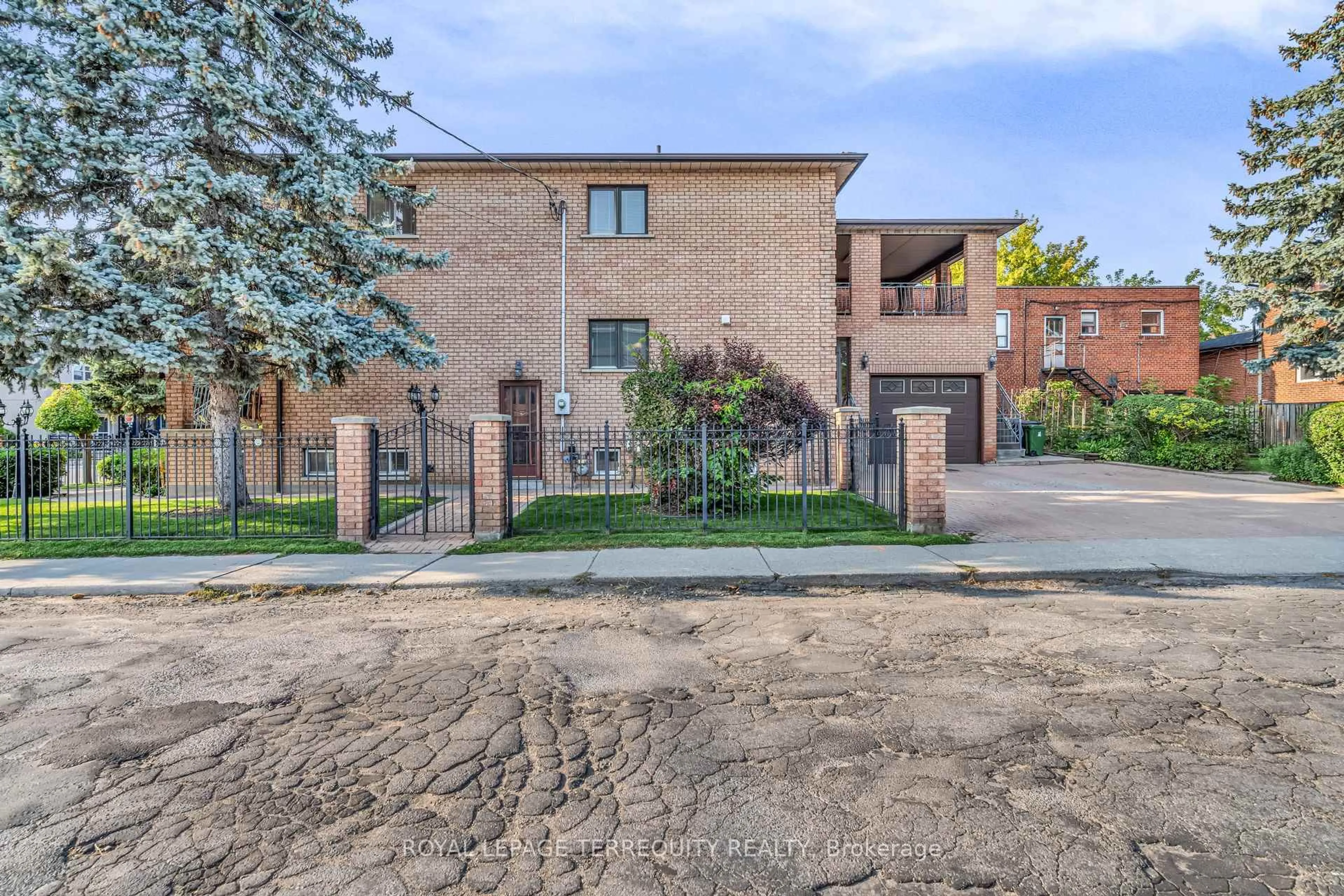 Home with brick exterior material, street for 531 Lauder Ave, Toronto Ontario M6E 3J5