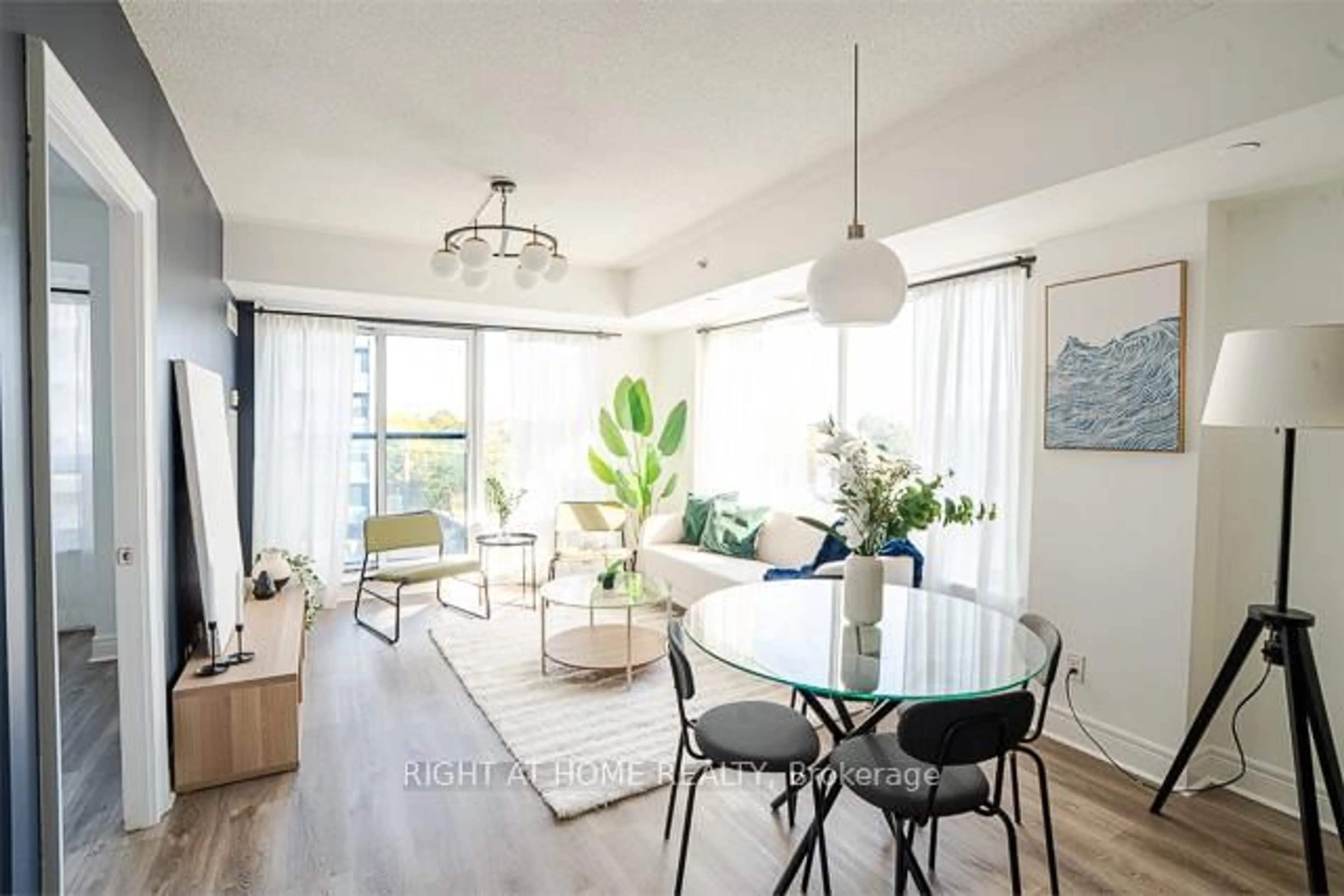 Living room with furniture, wood/laminate floor for 701 Sheppard Ave #512, Toronto Ontario M3H 0B2