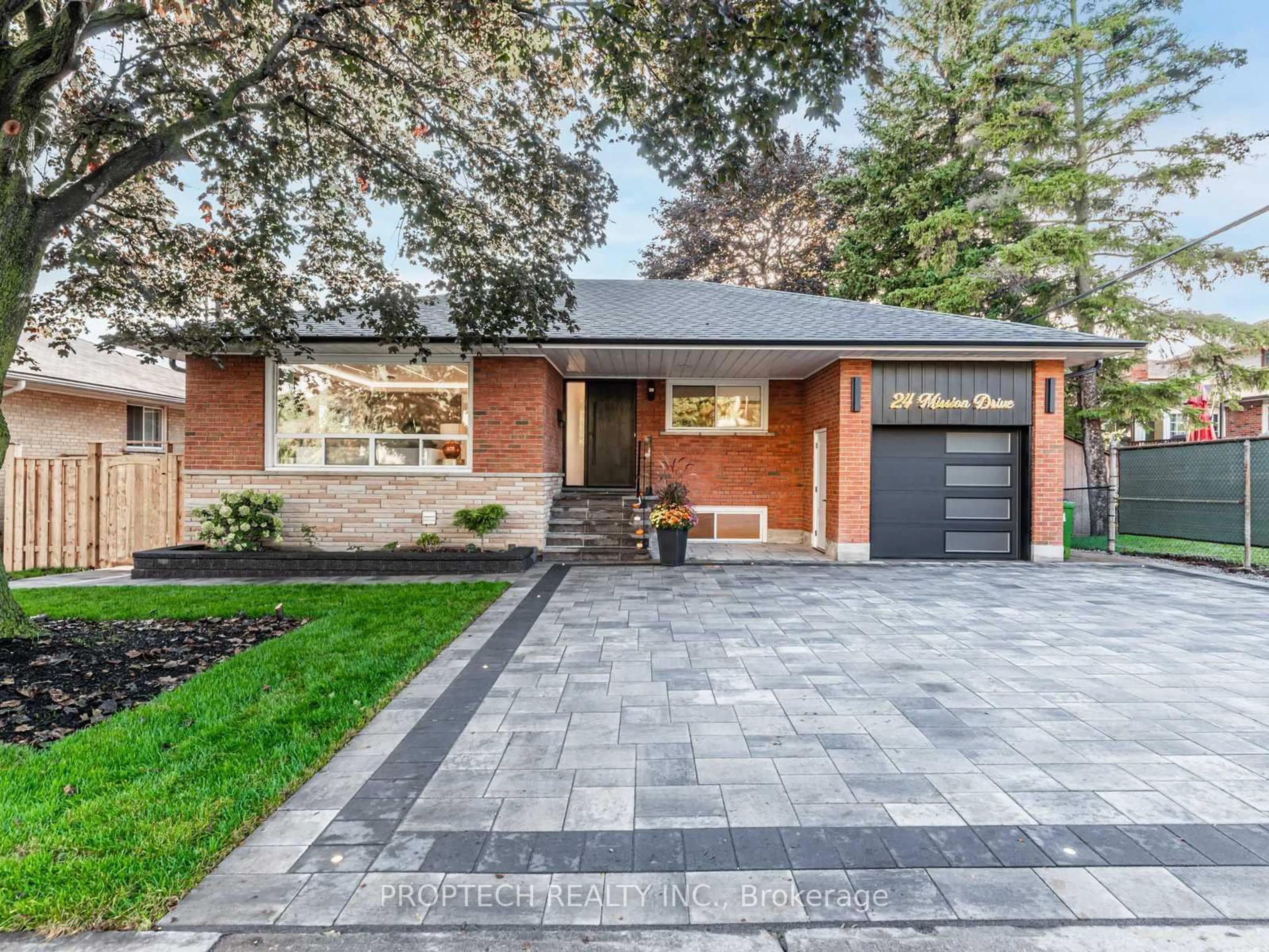Home with brick exterior material, street for 24 Mission Dr, Toronto Ontario M3A 2P2