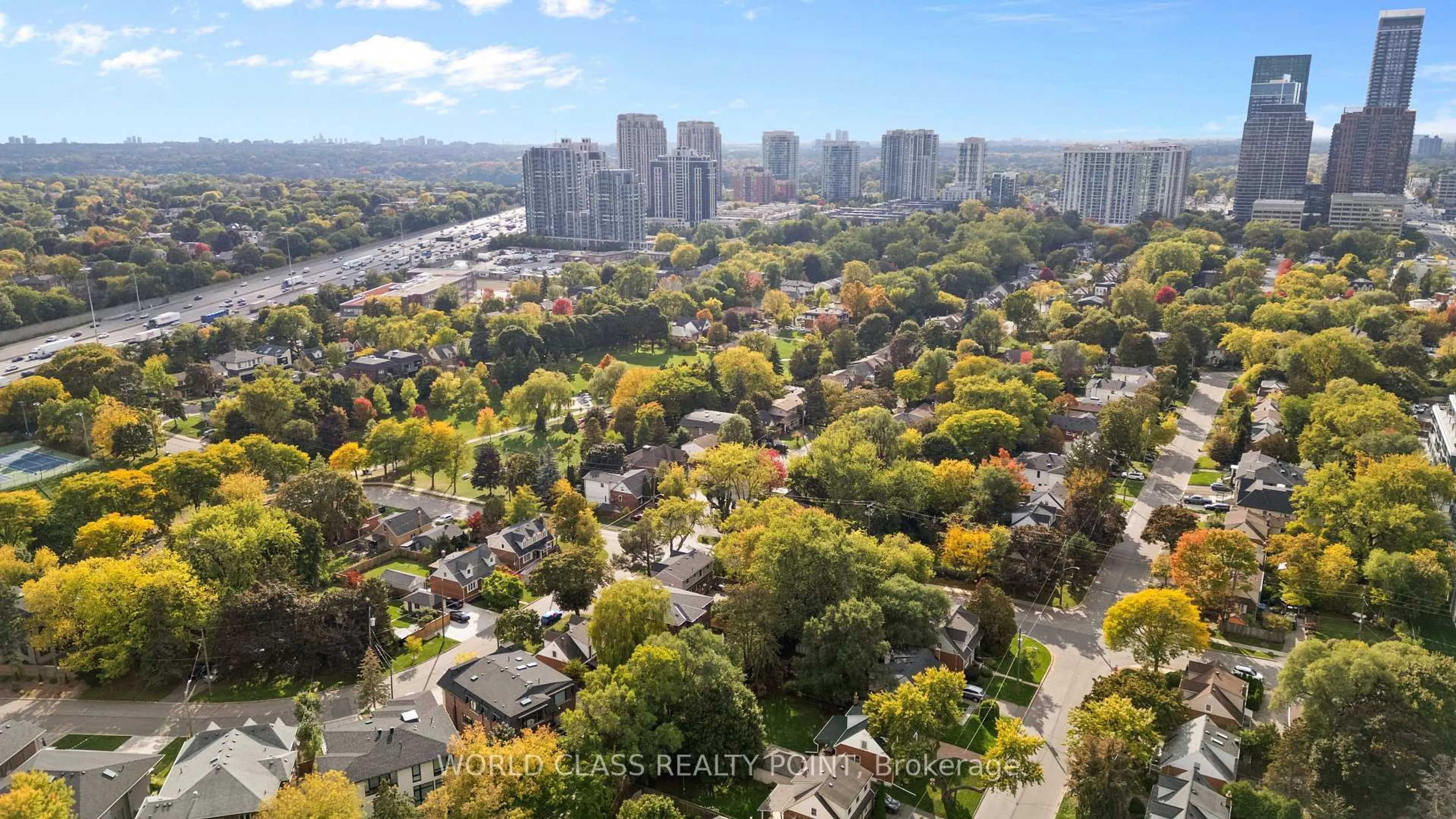 A pic from outside/outdoor area/front of a property/back of a property/a pic from drone, city buildings view from balcony for 118 Anndale Dr, Toronto Ontario M2N 2X5