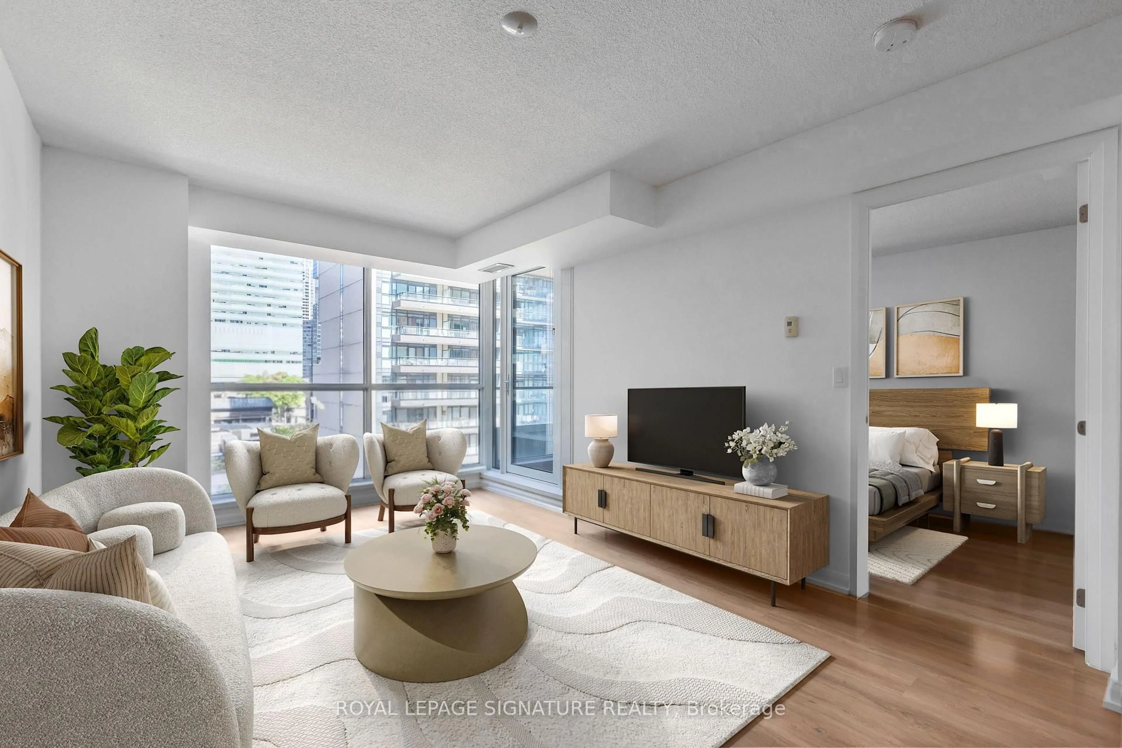 Living room with furniture, unknown for 111 Elizabeth St #805, Toronto Ontario M6K 1X3