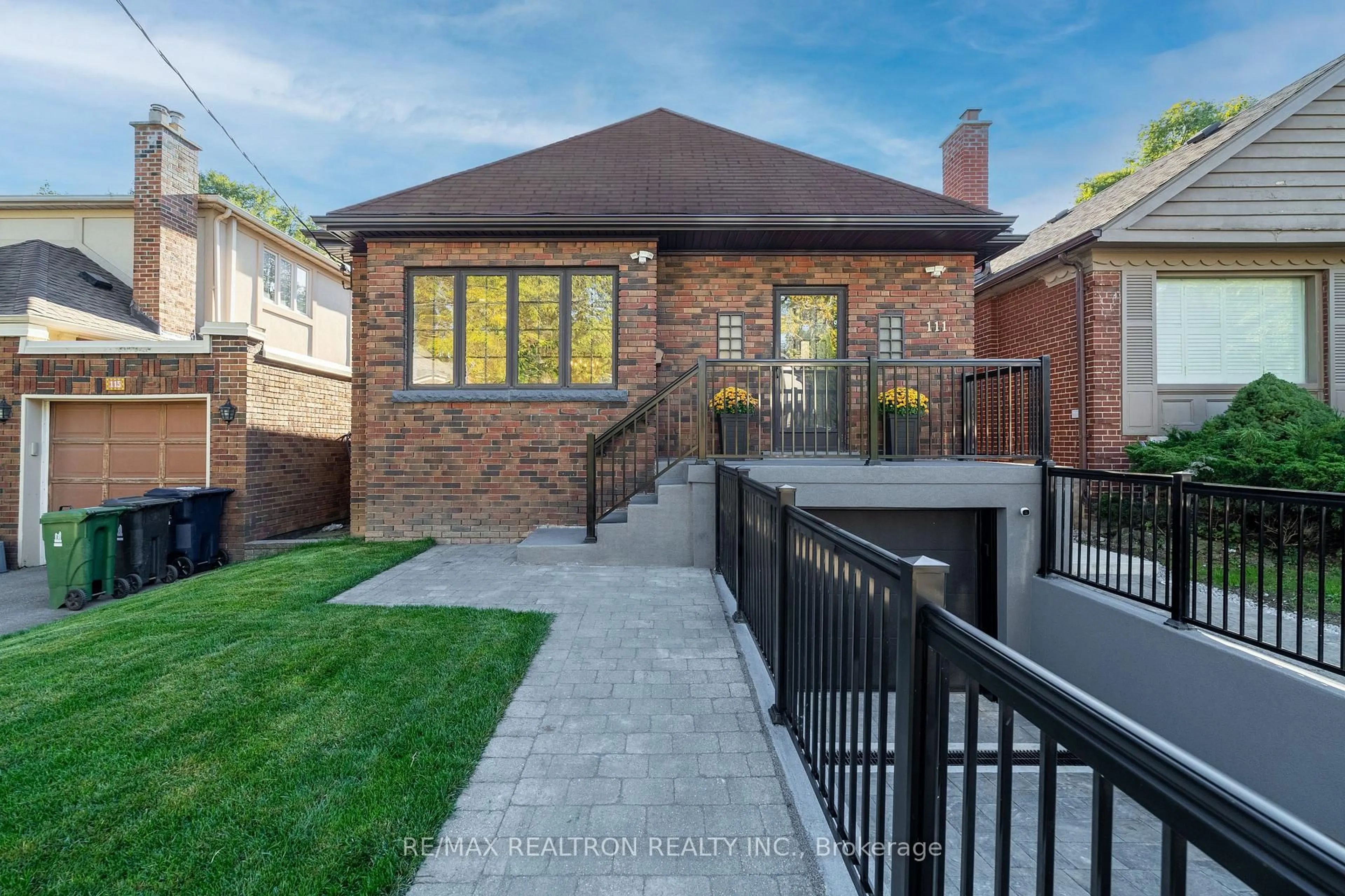 Home with brick exterior material, street for 111 Sutherland Dr, Toronto Ontario M4G 1H8
