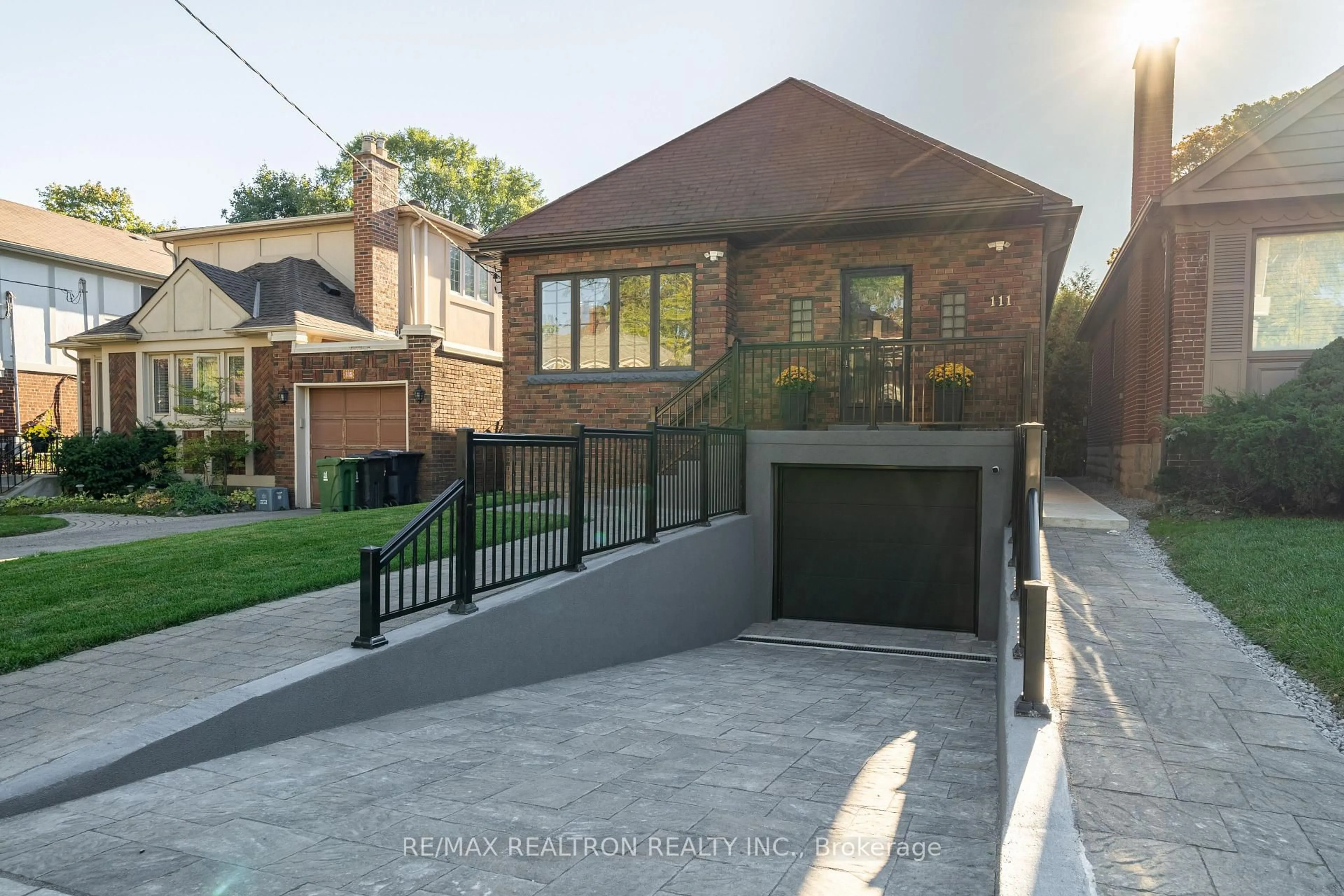 Home with brick exterior material, street for 111 Sutherland Dr, Toronto Ontario M4G 1H8