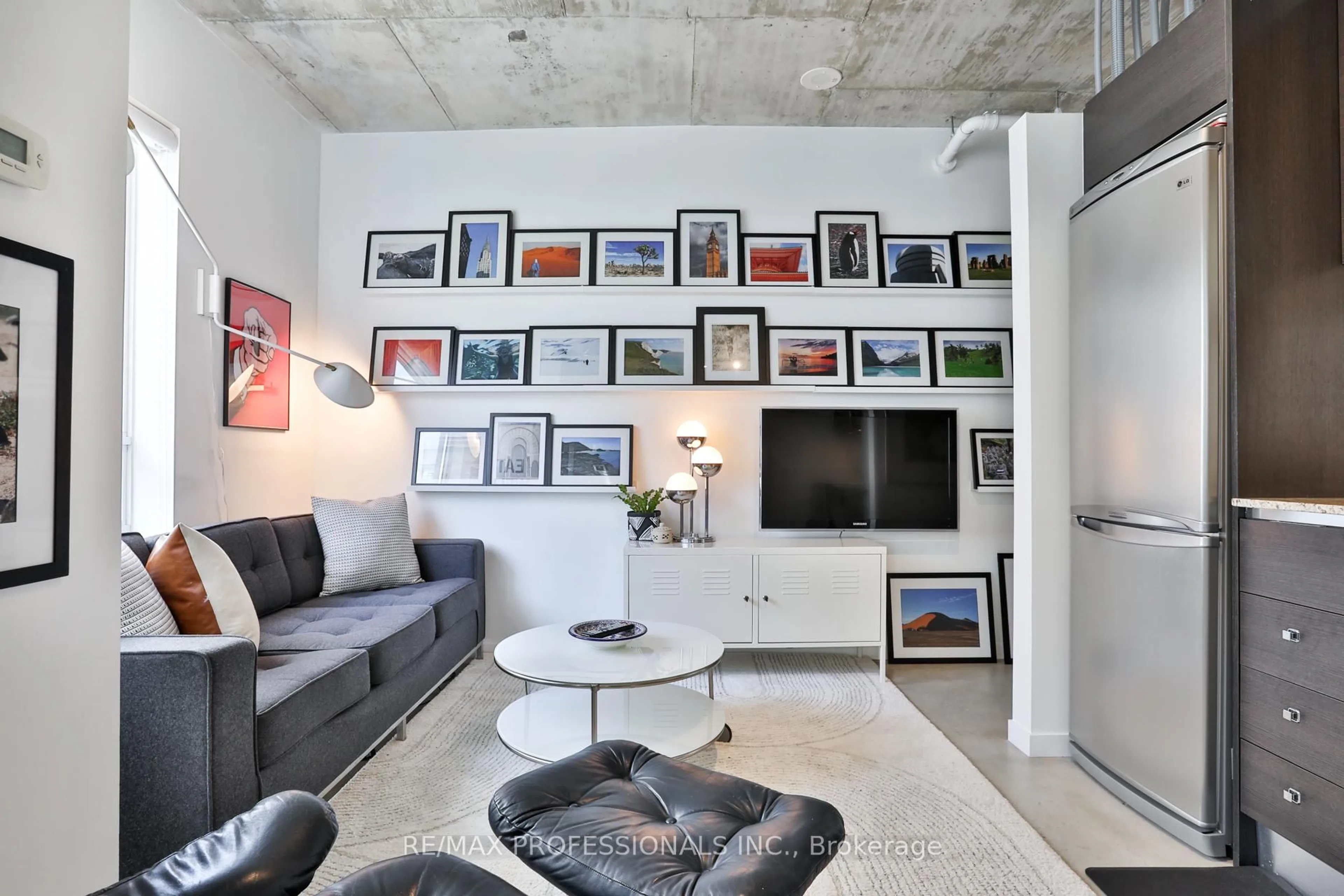 Living room with furniture, cement floor for 150 Sudbury St #509, Toronto Ontario M6J 3S8