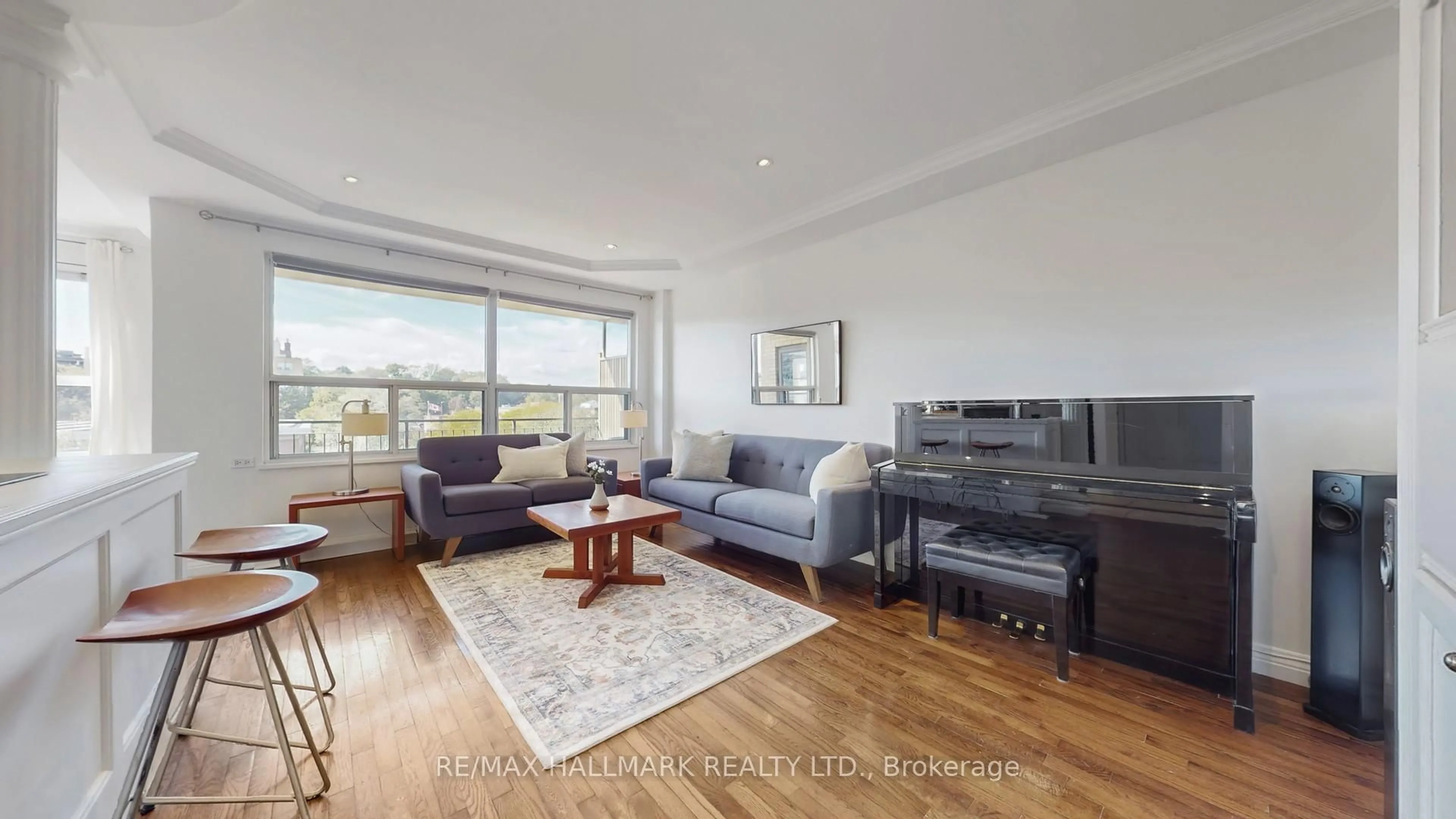 Living room with furniture, wood/laminate floor for 660 Eglinton Ave #508, Toronto Ontario M5N 1C3