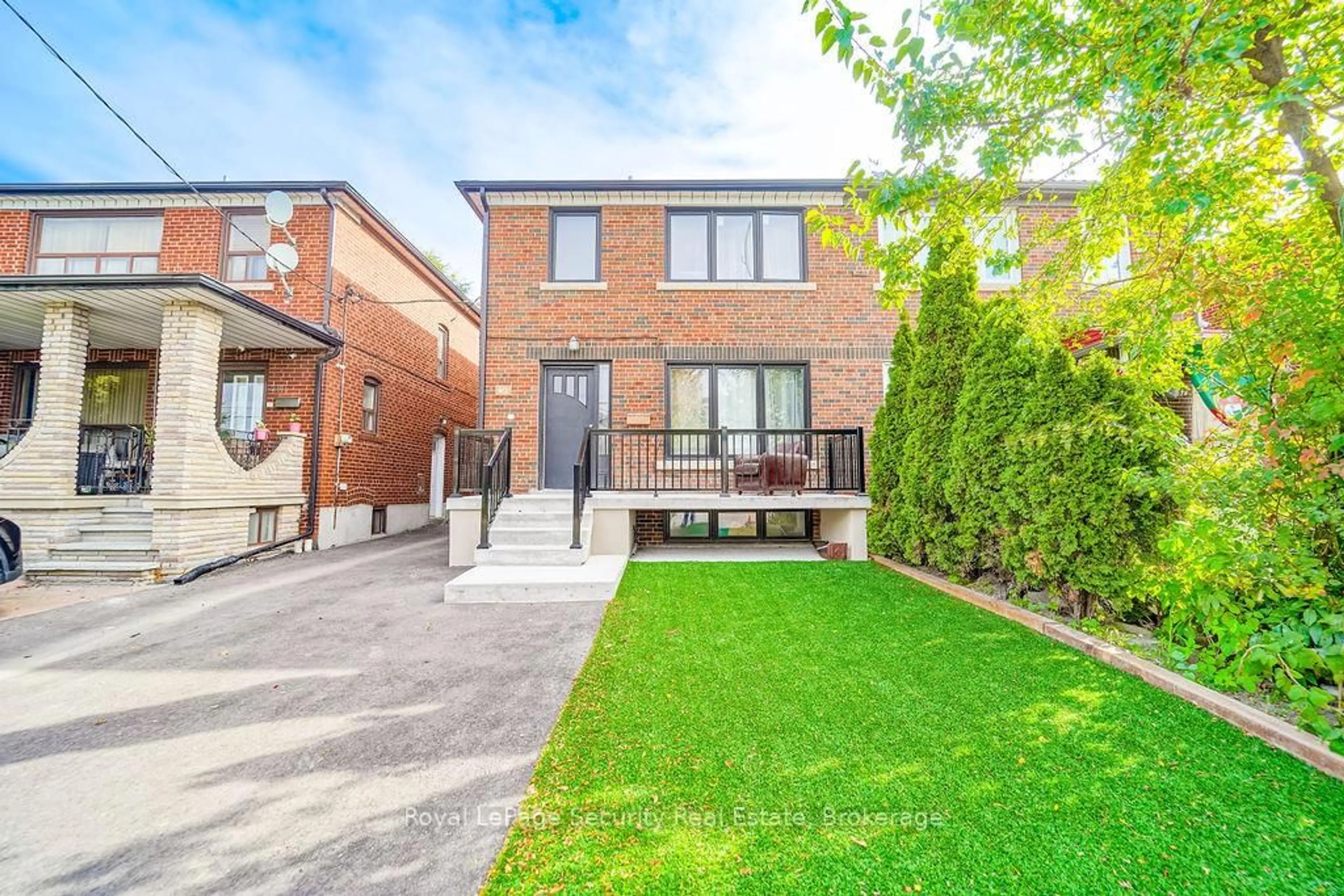 Home with brick exterior material, street for 2169 Dufferin St, Toronto Ontario M6E 3R9