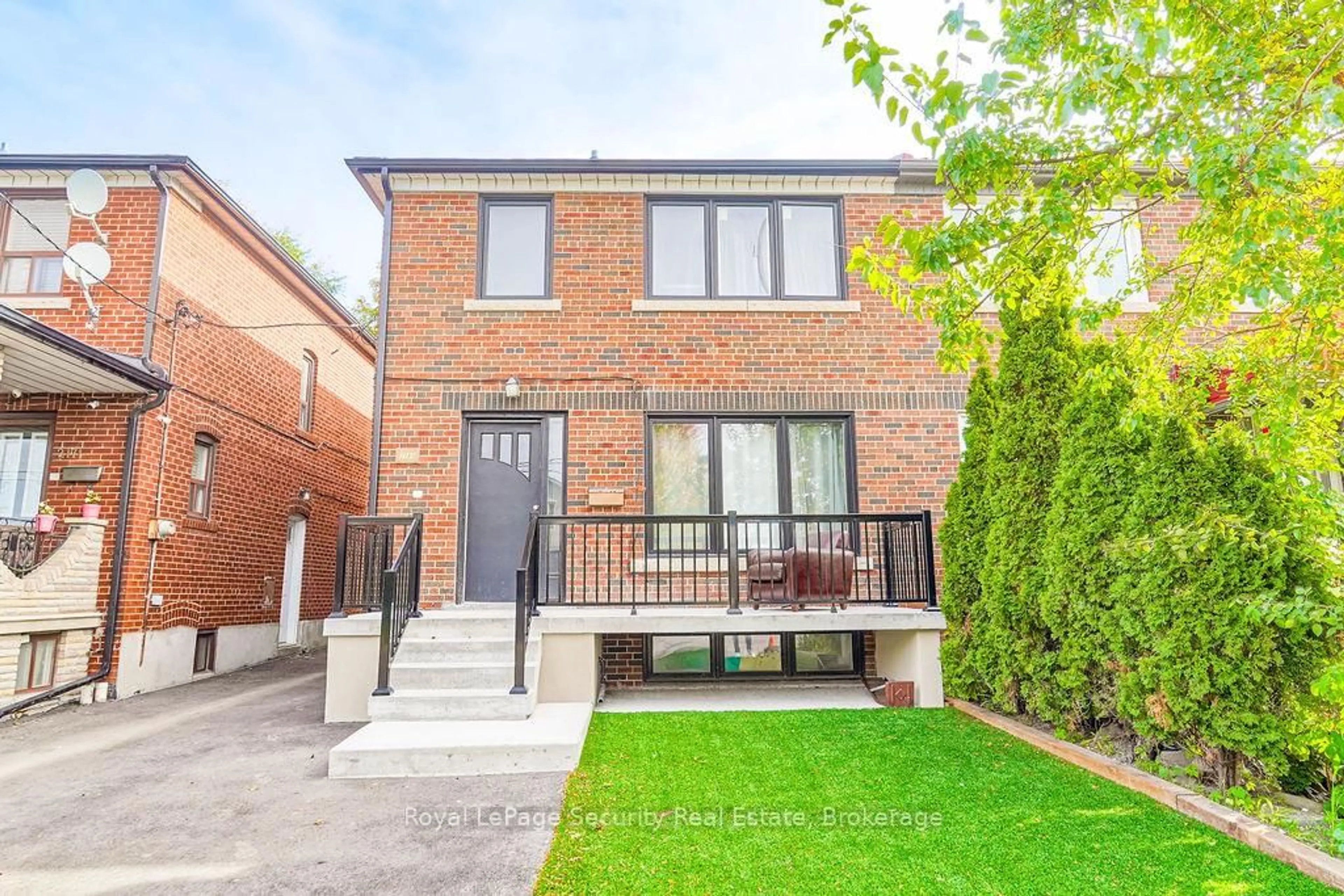 Home with brick exterior material, street for 2169 Dufferin St, Toronto Ontario M6E 3R9