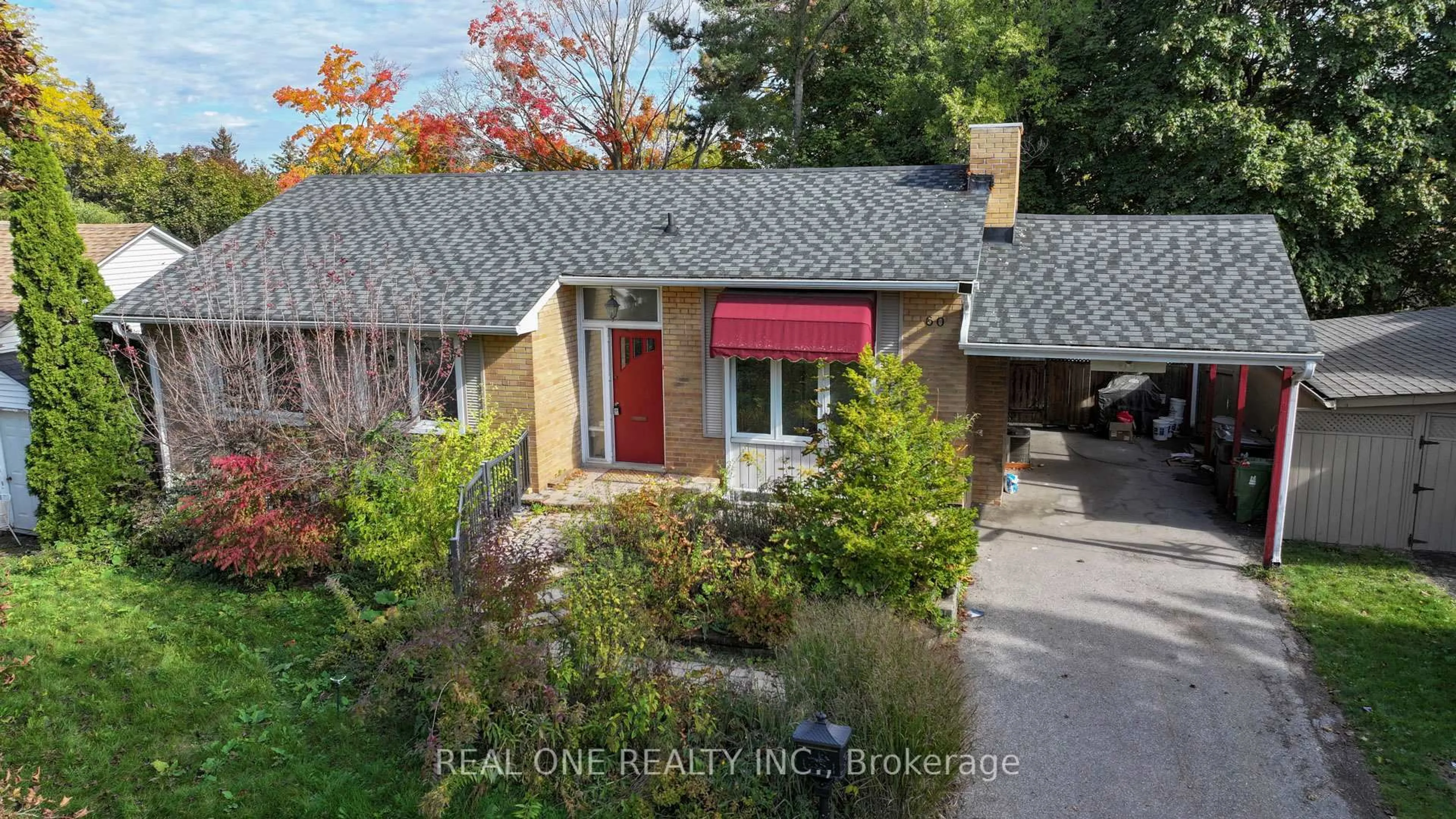 A pic from outside/outdoor area/front of a property/back of a property/a pic from drone, street for 60 Paperbirch Dr, Toronto Ontario M3C 2E7