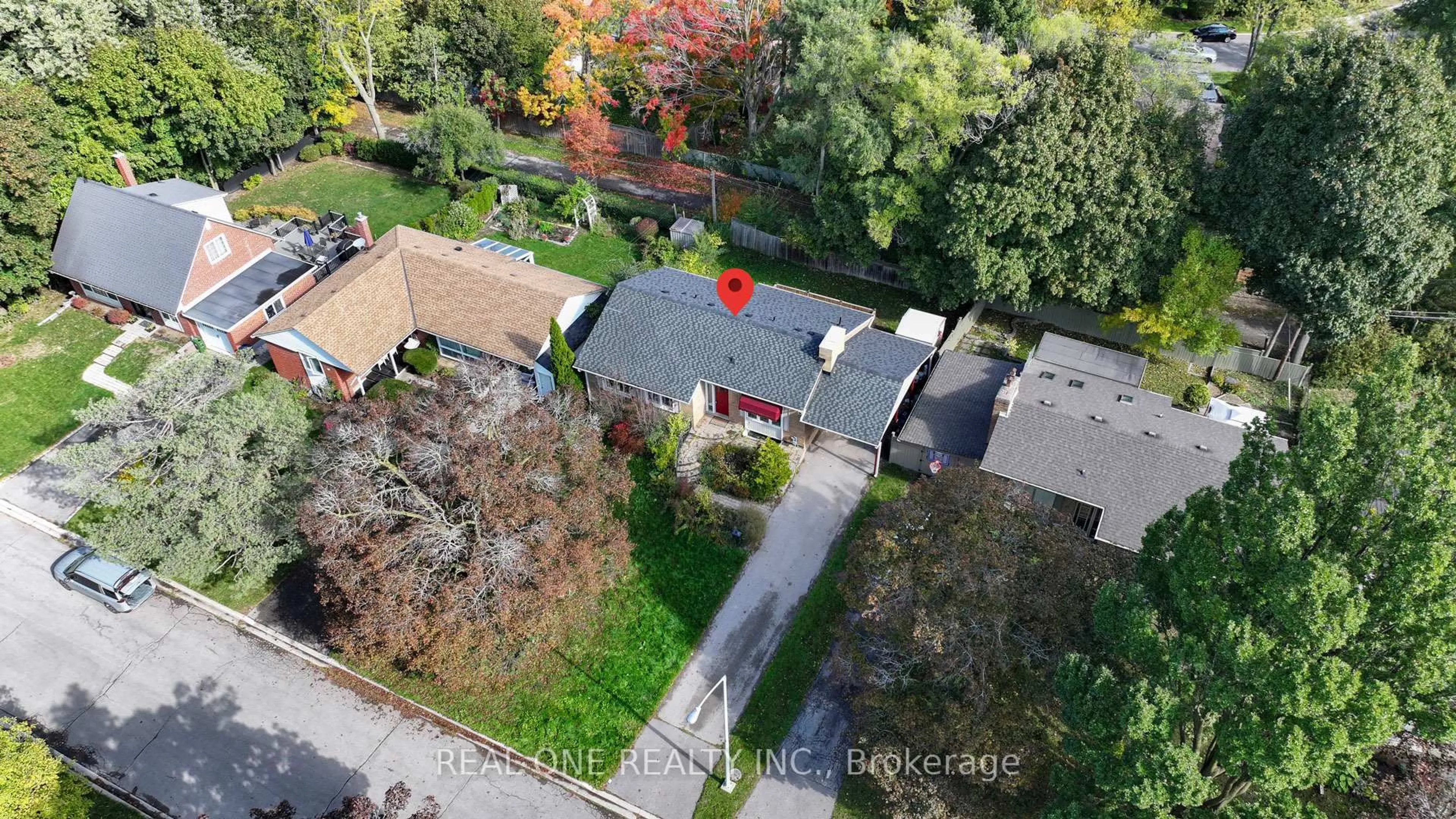 A pic from outside/outdoor area/front of a property/back of a property/a pic from drone, street for 60 Paperbirch Dr, Toronto Ontario M3C 2E7