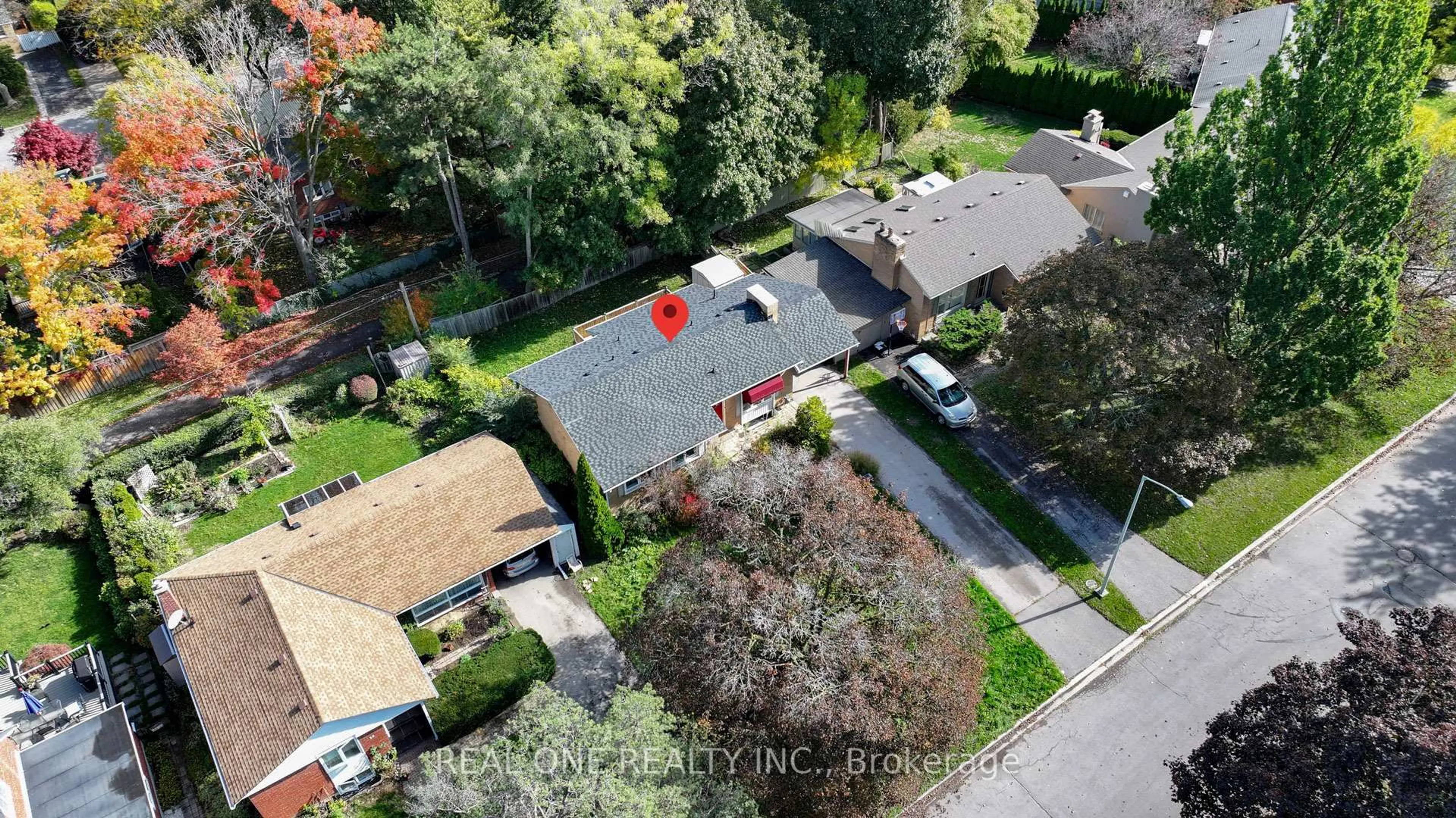 A pic from outside/outdoor area/front of a property/back of a property/a pic from drone, street for 60 Paperbirch Dr, Toronto Ontario M3C 2E7